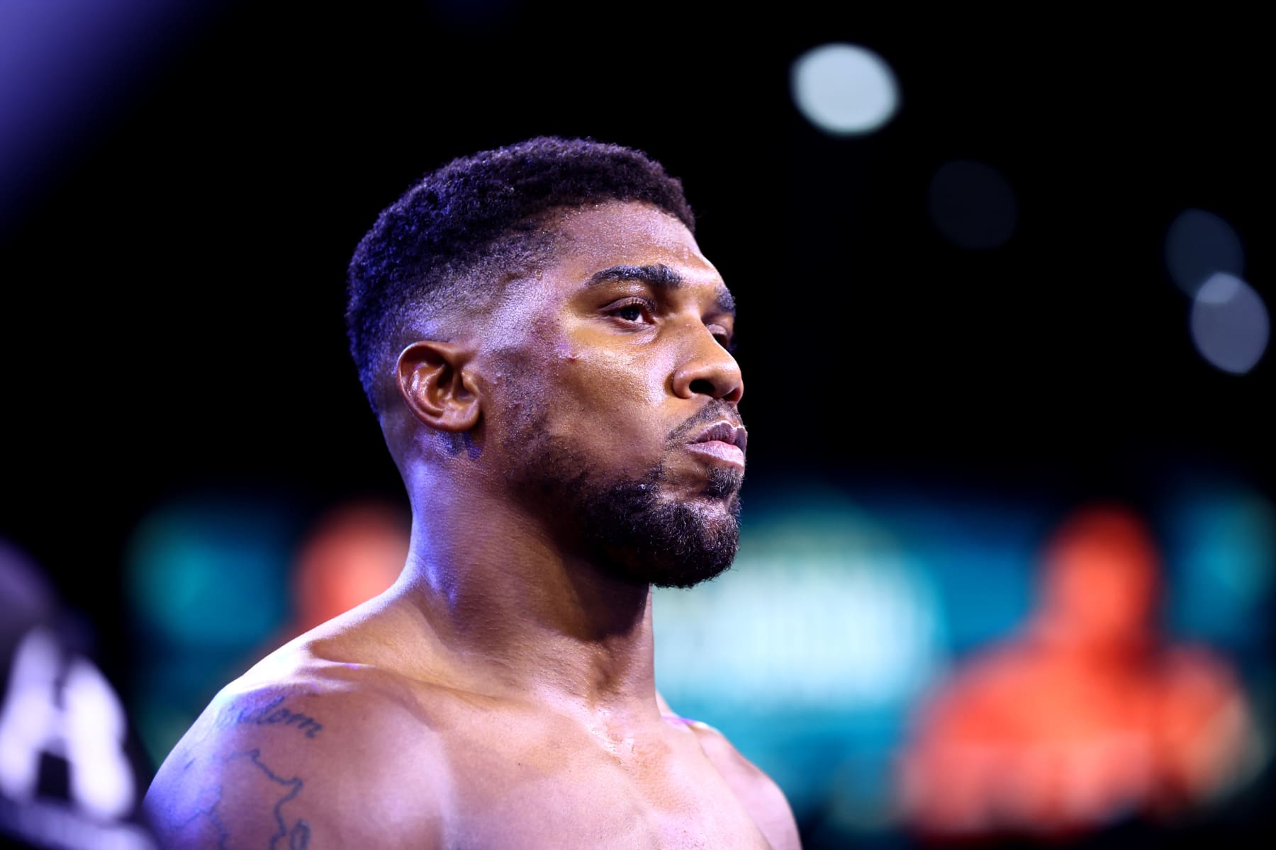 JEDDAH, SAUDI ARABIA - AUGUST 20: Anthony Joshua looks on ahead of their World Heavyweight Championship fight against Oleksandr Usyk  during the Rage on the Red Sea Heavyweight Title Fight at King Abdullah Sports City Arena on August 20, 2022 in Jeddah, Saudi Arabia. (Photo by Francois Nel/Getty Images)