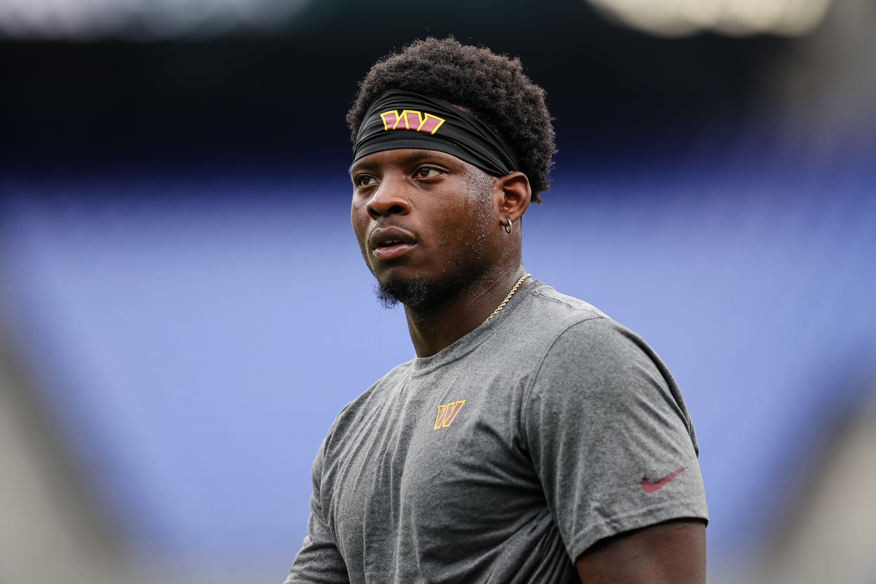 BALTIMORE, MD - AUGUST 27: Brian Robinson #8 of the Washington Commanders warms up before the preseason game against the Baltimore Ravens at M&T Bank Stadium on August 27, 2022 in Baltimore, Maryland. (Photo by Scott Taetsch/Getty Images)