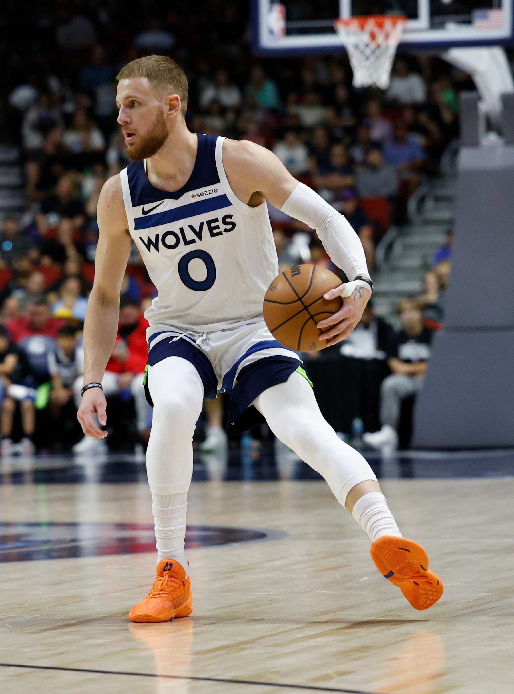 DES MOINES, IOWA - OCTOBER 11: Donte DiVincenzo #0 of the Minnesota Timberwolves in the first half of play during a preseason game at Wells Fargo Arena on October 11, 2024, in Des Moines, Iowa. The Minnesota Timberwolves won 121-111 over the Philadelphia 76ers. NOTE TO USER: User expressly acknowledges and agrees that, by downloading and or using this photograph, User is consenting to the terms and conditions of the Getty Images License Agreement (Photo by David K Purdy/Getty Images)