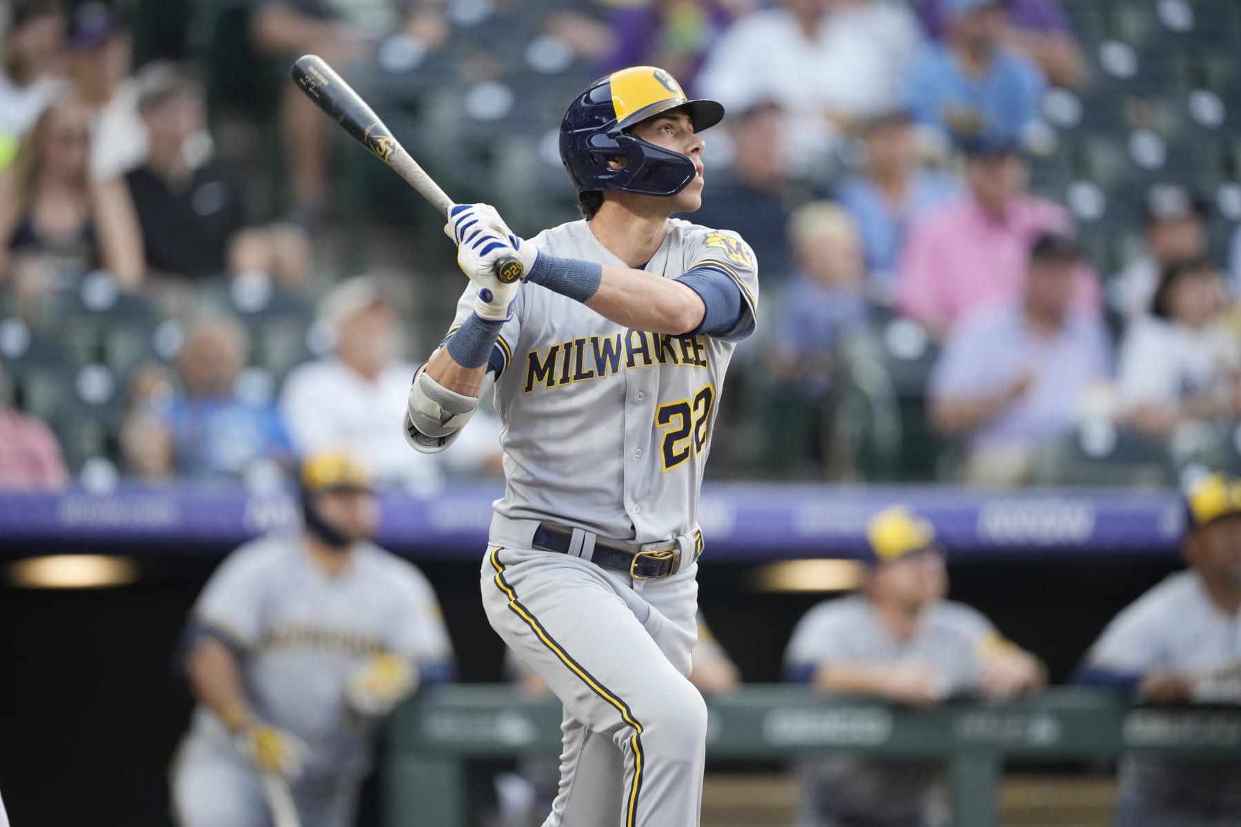 Milwaukee Brewers' Christian Yelich follows the flight of his solo home run into the third deck off Colorado Rockies starting pitcher Chad Kuhl in the first inning of a baseball game Tuesday, Sept. 6, 2022, in Denver. (AP Photo/David Zalubowski)