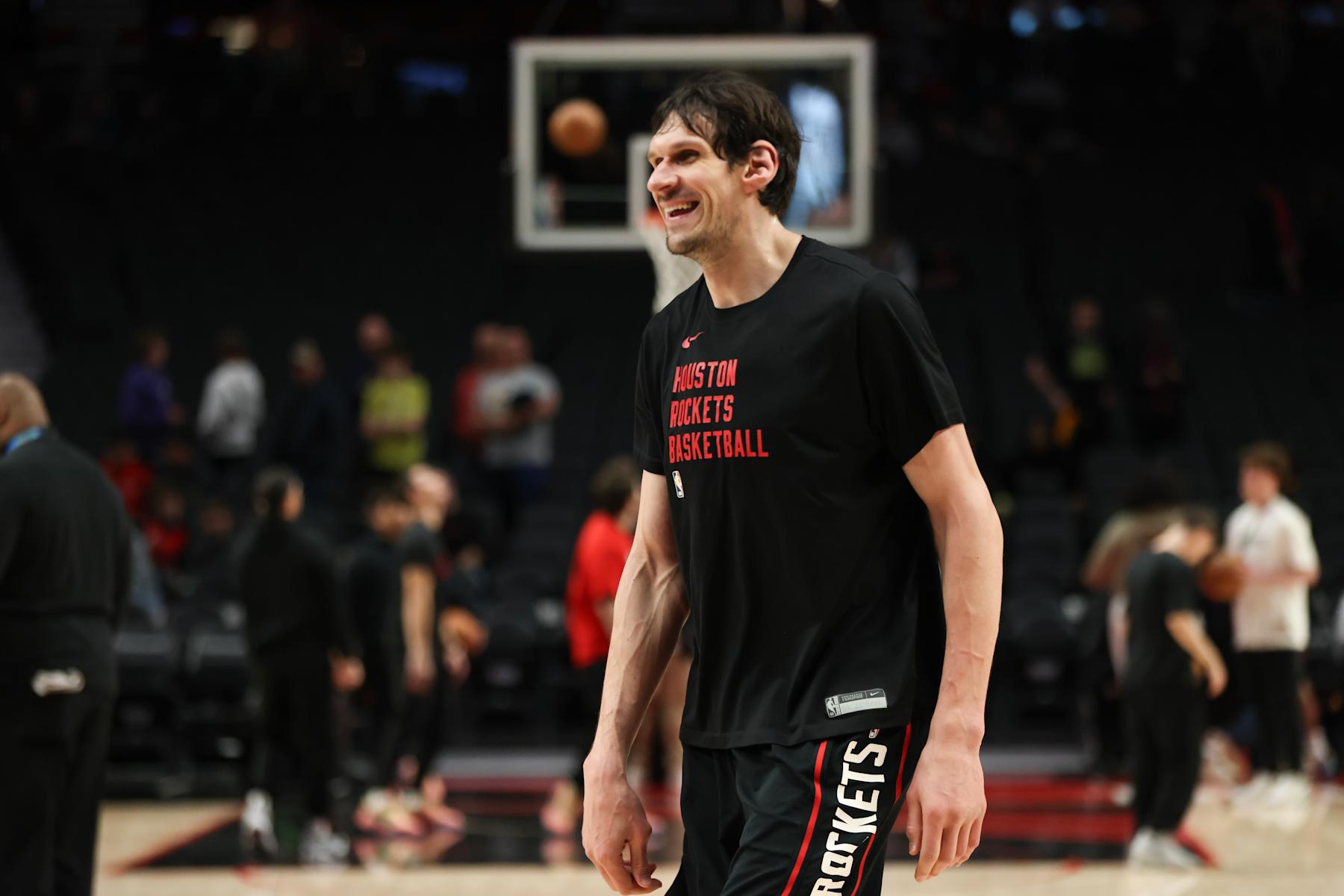PORTLAND, OREGON - APRIL 12: Boban Marjanovic #51 of the Houston Rockets warms up before a game against the Portland Trail Blazers at Moda Center on April 12, 2024 in Portland, Oregon. NOTE TO USER: User expressly acknowledges and agrees that, by downloading and or using this photograph, User is consenting to the terms and conditions of the Getty Images License Agreement.  (Photo by Amanda Loman/Getty Images)