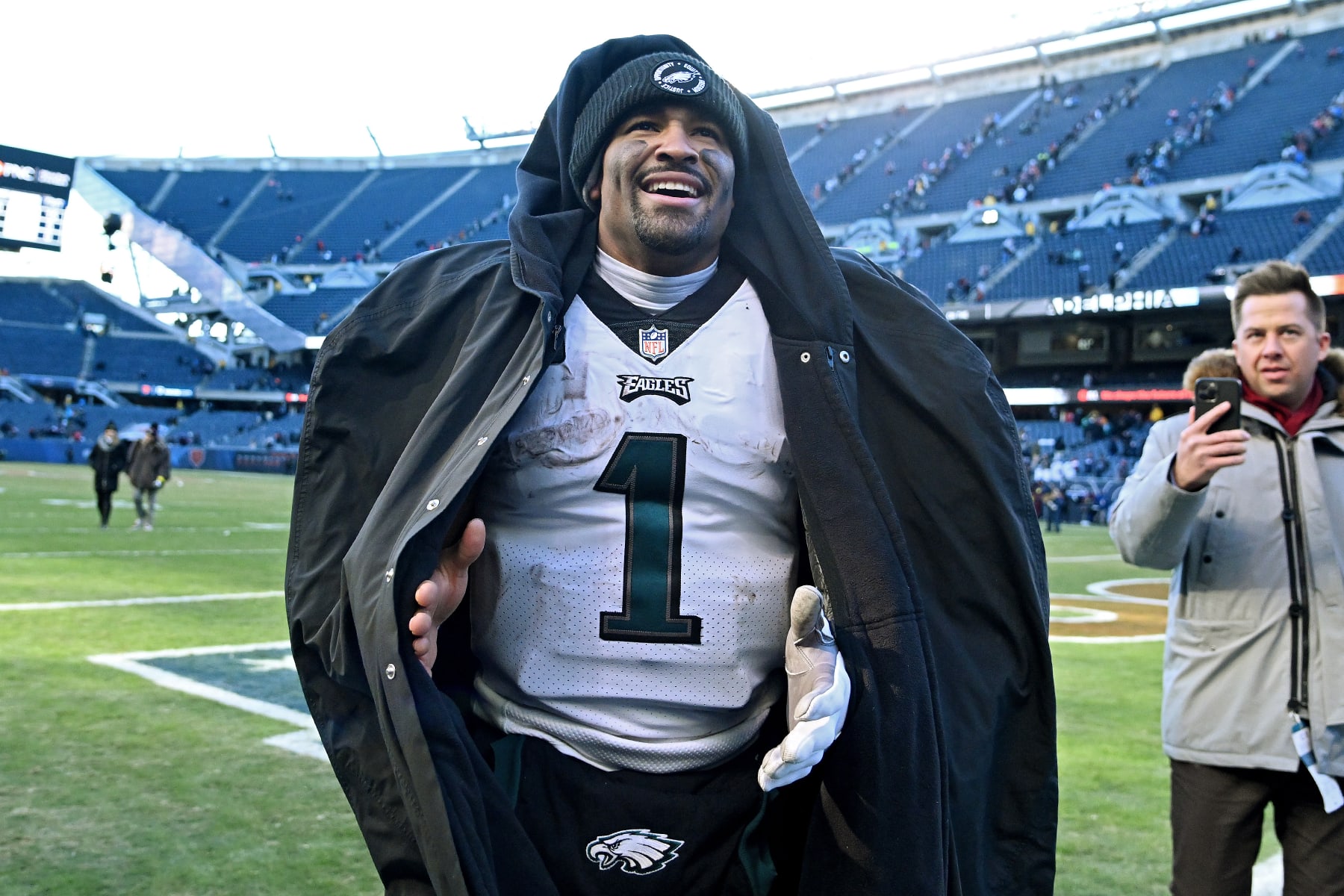 CHICAGO, ILLINOIS - DECEMBER 18: Jalen Hurts #1 of the Philadelphia Eagles walks off the field after a win over the Chicago Bears at Soldier Field on December 18, 2022 in Chicago, Illinois. (Photo by Quinn Harris/Getty Images)