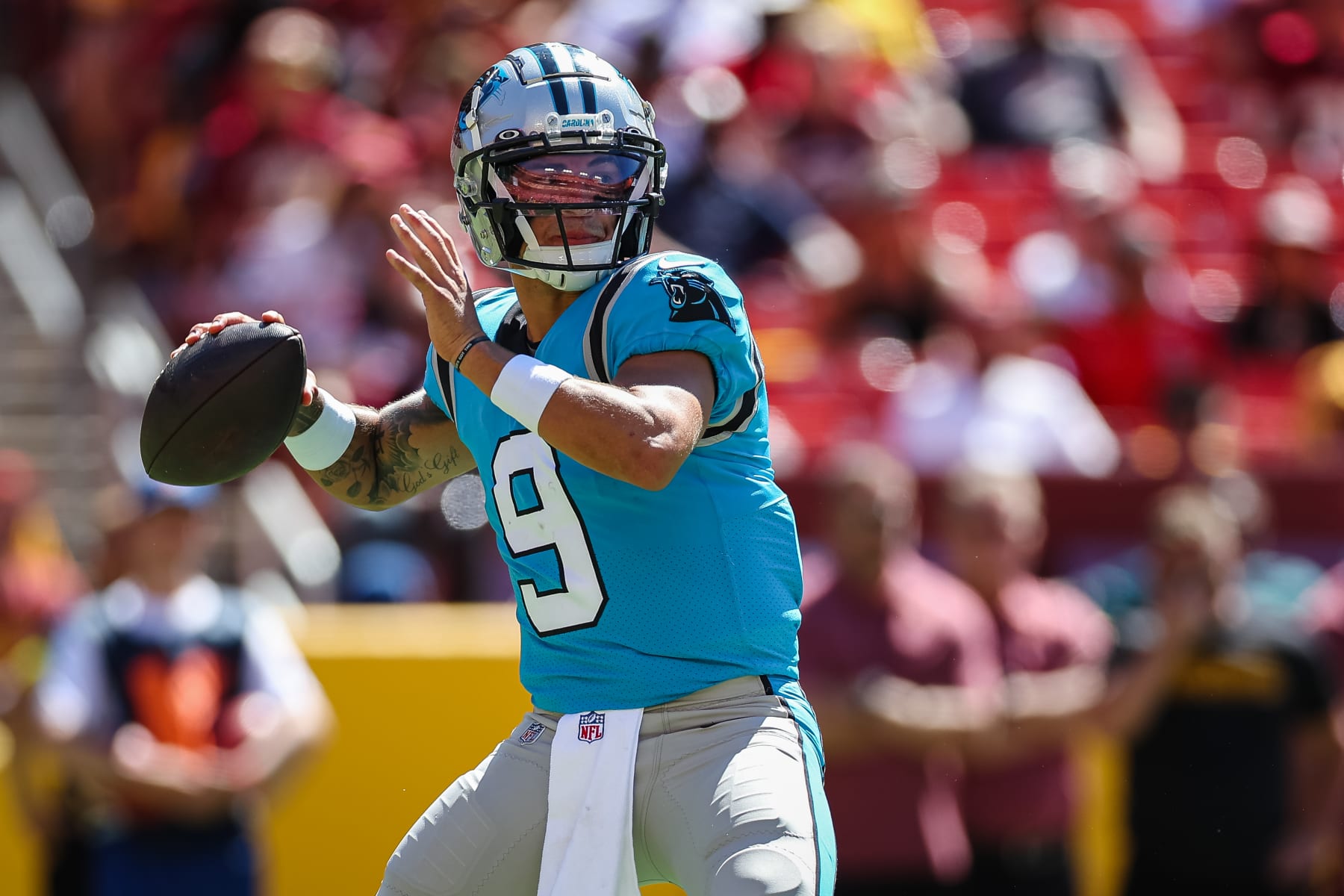 LANDOVER, MD - AUGUST 13: Matt Corral #9 of the Carolina Panthers attempts a pass against the Washington Commanders during the second half of the preseason game at FedExField on August 13, 2022 in Landover, Maryland. (Photo by Scott Taetsch/Getty Images)