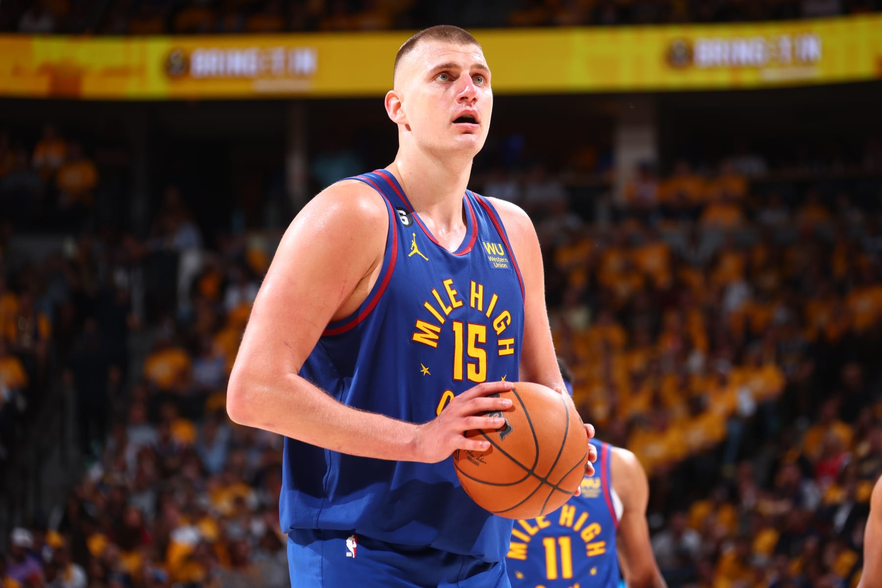 DENVER, CO - JUNE 1: Nikola Jokic #15 of the Denver Nuggets shoots a free throw during Game One of the 2023 NBA Finals against the Miami Heat on June 1, 2023 at the Ball Arena in Denver, Colorado. NOTE TO USER: User expressly acknowledges and agrees that, by downloading and/or using this Photograph, user is consenting to the terms and conditions of the Getty Images License Agreement. Mandatory Copyright Notice: Copyright 2023 NBAE (Photo by Nathaniel S. Butler/NBAE via Getty Images)
