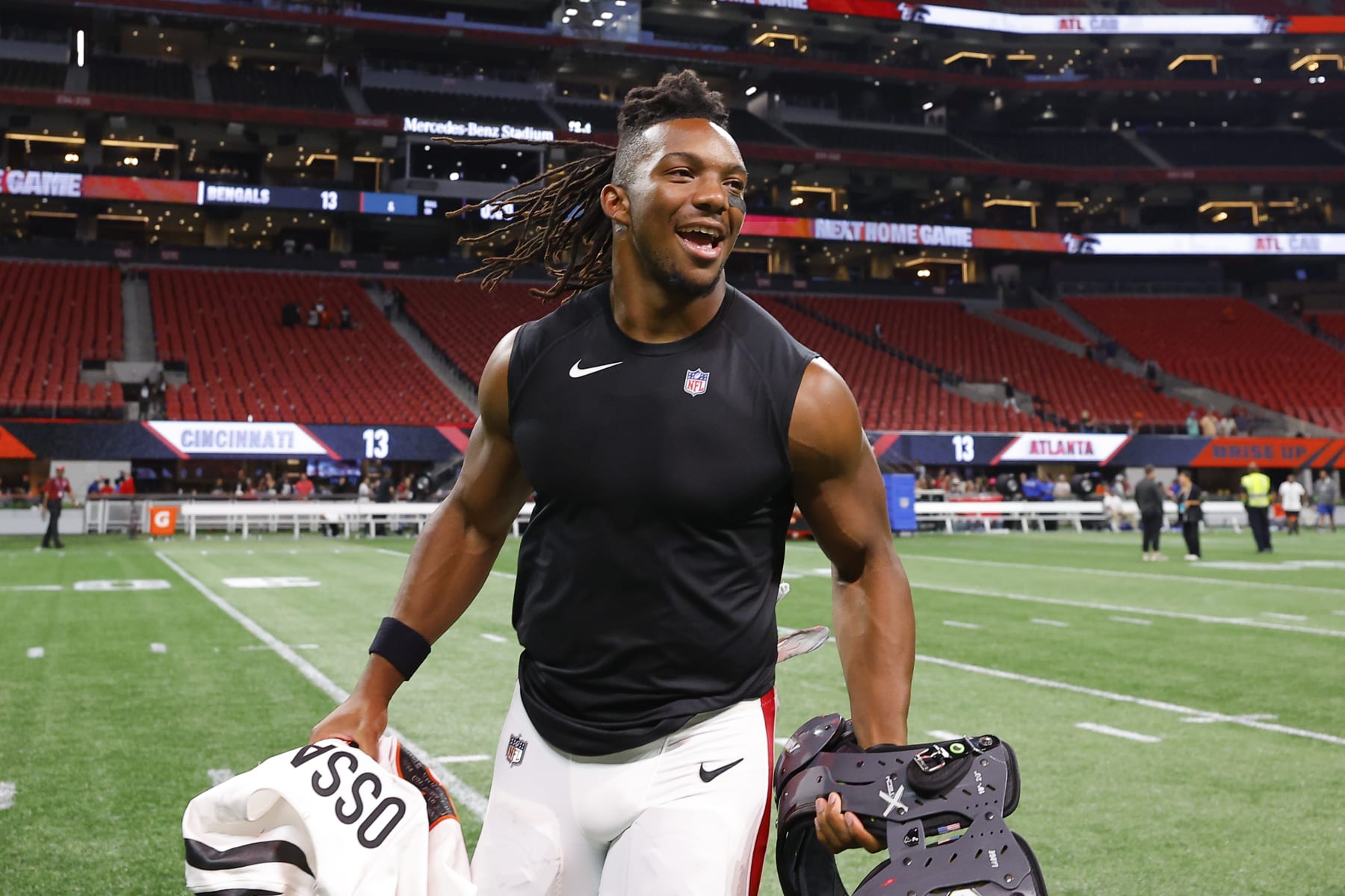 ATLANTA, GEORGIA - AUGUST 18: Bijan Robinson #7 of the Atlanta Falcons reacts at the conclusion of a preseason game against the Cincinnati Bengals at Mercedes-Benz Stadium on August 18, 2023 in Atlanta, Georgia. (Photo by Todd Kirkland/Getty Images)