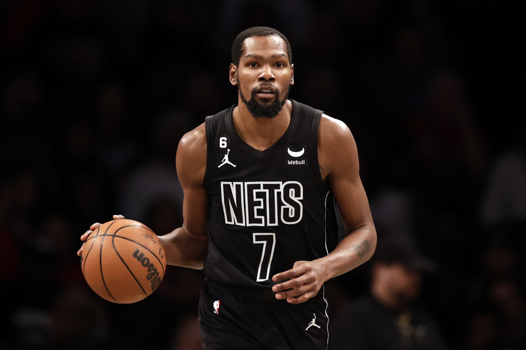 NEW YORK, NEW YORK - DECEMBER 2: Kevin Durant #7 of the Brooklyn Nets dribbles against the Toronto Raptors in the first half at Barclays Center on December 2, 2022 in New York City. NOTE TO USER: User expressly acknowledges and agrees that, by downloading and or using this Photograph, user is consenting to the terms and conditions of the Getty Images License Agreement.  (Photo by Adam Hunger/Getty Images)