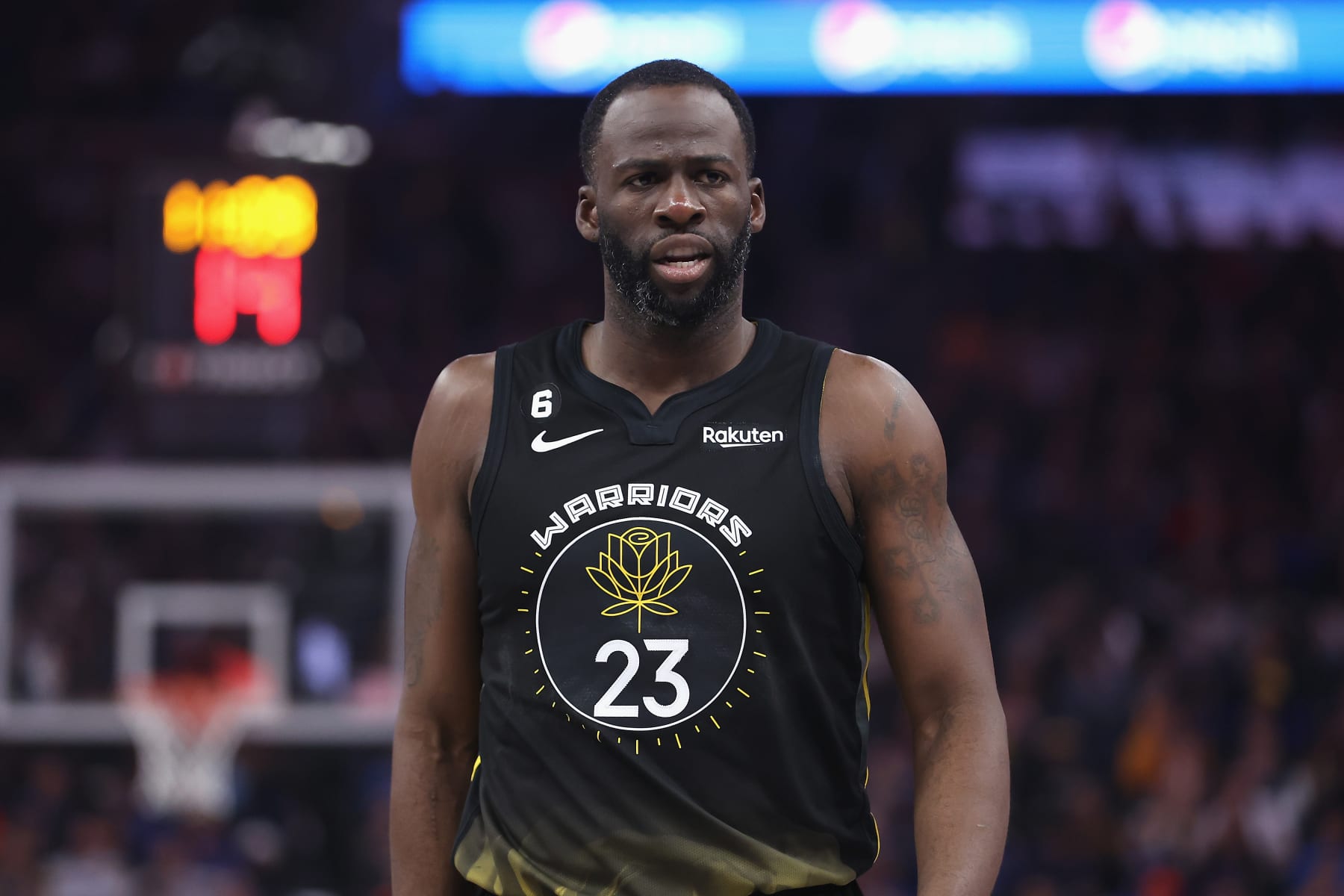 SAN FRANCISCO, CALIFORNIA - FEBRUARY 13: Draymond Green #23 of the Golden State Warriors looks on in the second quarter against the Washington Wizards at Chase Center on February 13, 2023 in San Francisco, California. NOTE TO USER: User expressly acknowledges and agrees that, by downloading and/or using this photograph, User is consenting to the terms and conditions of the Getty Images License Agreement. (Photo by Lachlan Cunningham/Getty Images)