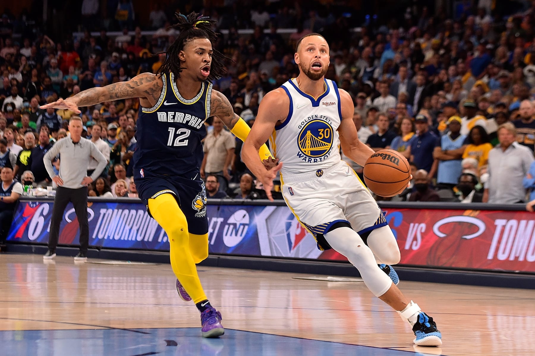 MEMPHIS, TENNESSEE - MAY 03: Stephen Curry #30 of the Golden State Warriors goes to the basket against Ja Morant #12 of the Memphis Grizzlies during Game Two of the Western Conference Semifinals of the NBA Playoffs at FedExForum on May 03, 2022 in Memphis, Tennessee. NOTE TO USER: User expressly acknowledges and agrees that, by downloading and or using this photograph, User is consenting to the terms and conditions of the Getty Images License Agreement. (Photo by Justin Ford/Getty Images) MEMPHIS, TENNESSEE - MAY 03: Stephen Curry #30 of the Golden State Warriors goes to the basket against Ja Morant #12 of the Memphis Grizzlies during Game Two of the Western Conference Semifinals of the NBA Playoffs at FedExForum on May 03, 2022 in Memphis, Tennessee. NOTE TO USER: User expressly acknowledges and agrees that, by downloading and or using this photograph, User is consenting to the terms and conditions of the Getty Images License Agreement. (Photo by Justin Ford/Getty Images)