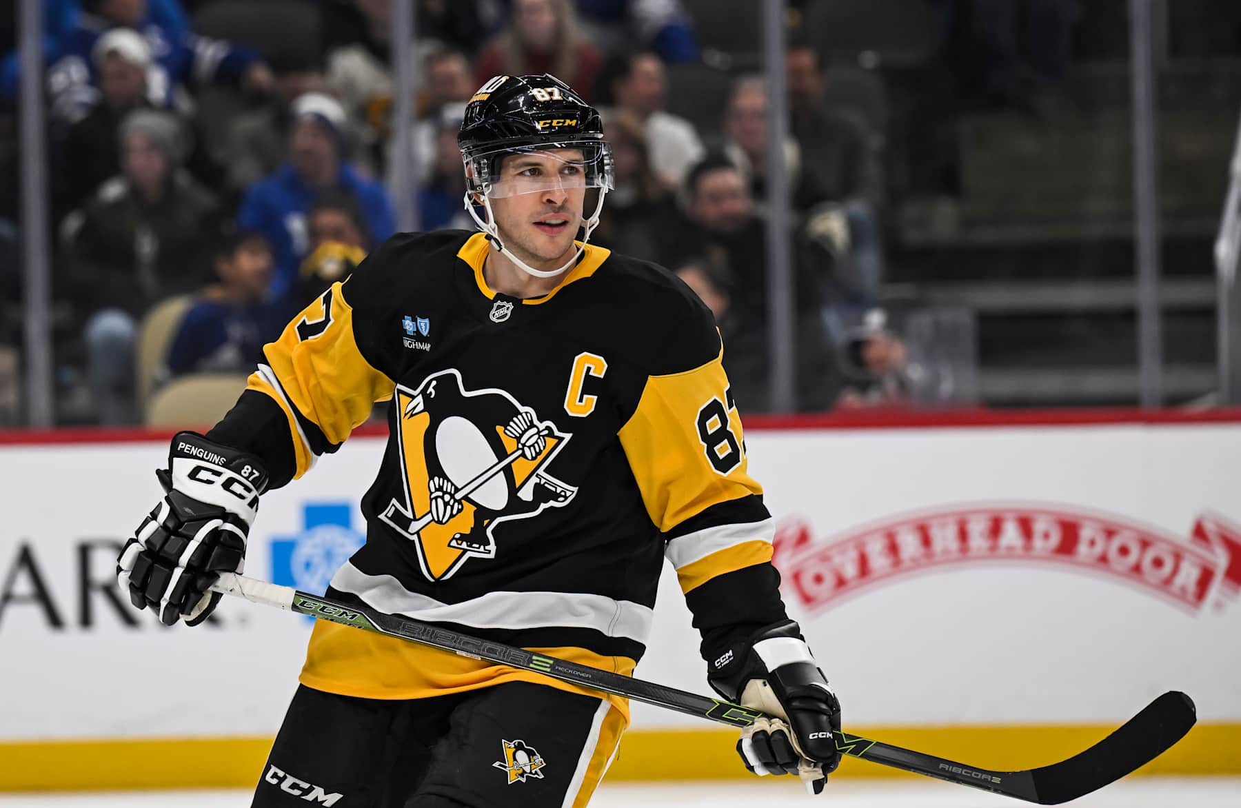 PITTSBURGH, PA - DECEMBER 07: Pittsburgh Penguins center Sidney Crosby (87) looks on during the second period in the NHL game between the Pittsburgh Penguins and the Toronto Maple Leafs on December 7, 2024, at PPG Paints Arena in Pittsburgh, PA. (Photo by Jeanine Leech/Icon Sportswire via Getty Images)