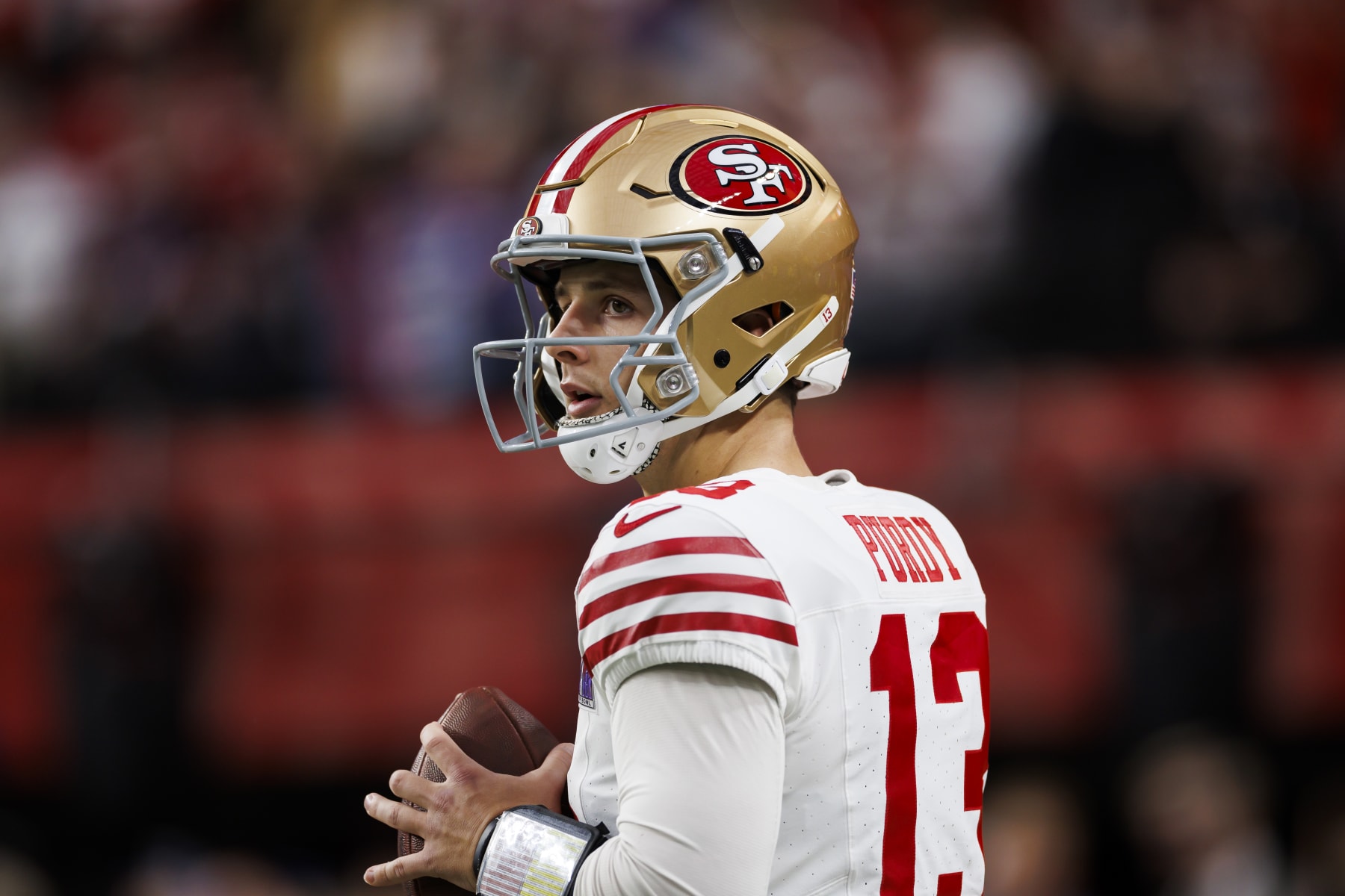 LAS VEGAS, NEVADA - FEBRUARY 11: Brock Purdy #13 of the San Francisco 49ers looks to throw a pass on the sideline before Super Bowl LVIII against the Kansas City Chiefs at Allegiant Stadium on February 11, 2024 in Las Vegas, Nevada. (Photo by Ryan Kang/Getty Images)