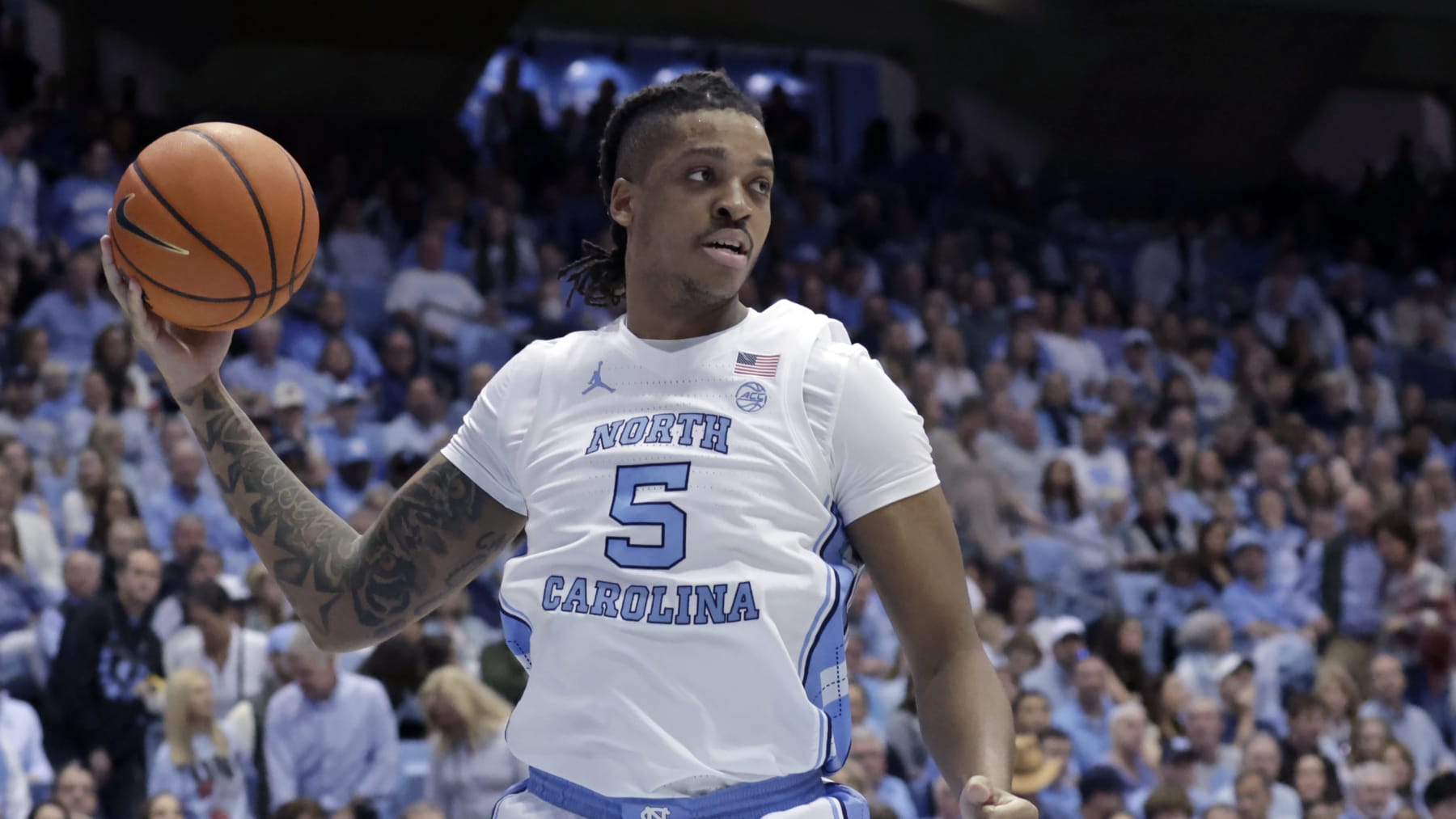North Carolina forward Armando Bacot (5) grabs a rebound against Clemson during the second half of an NCAA college basketball game, Saturday, Feb. 11, 2023, in Chapel Hill, N.C. (AP Photo/Chris Seward)