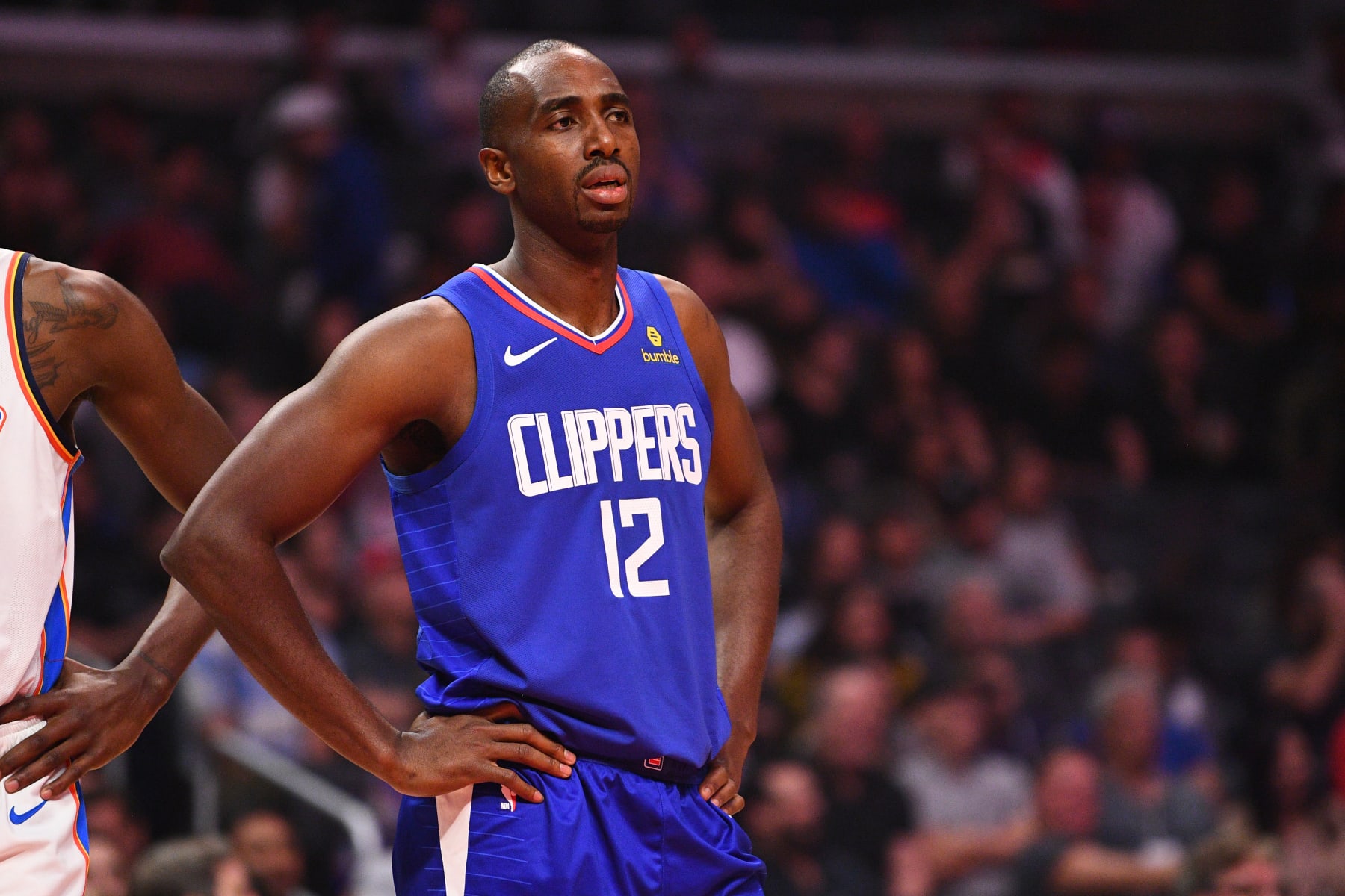 LOS ANGELES, CA - OCTOBER 19: Los Angeles Clippers Forward Luc Mbah a Moute (12) looks on during a NBA game between the Oklahoma City Thunder and the Los Angeles Clippers on October 19, 2018 at STAPLES Center in Los Angeles, CA. (Photo by Brian Rothmuller/Icon Sportswire via Getty Images)