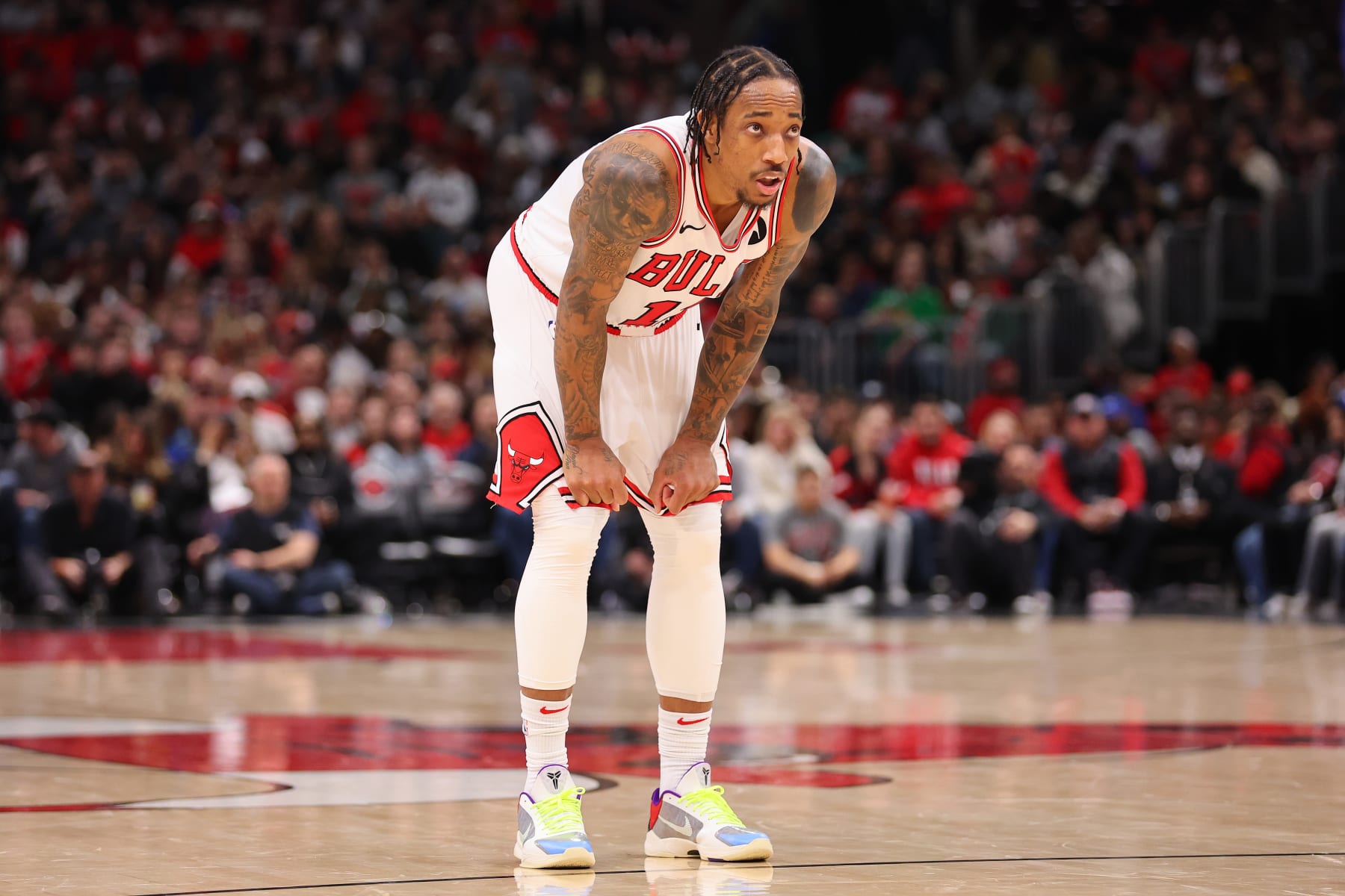 CHICAGO, ILLINOIS - FEBRUARY 03: DeMar DeRozan #11 of the Chicago Bulls reacts against the Sacramento Kings during the second half at the United Center on February 03, 2024 in Chicago, Illinois. NOTE TO USER: User expressly acknowledges and agrees that, by downloading and or using this photograph, User is consenting to the terms and conditions of the Getty Images License Agreement.  (Photo by Michael Reaves/Getty Images)
