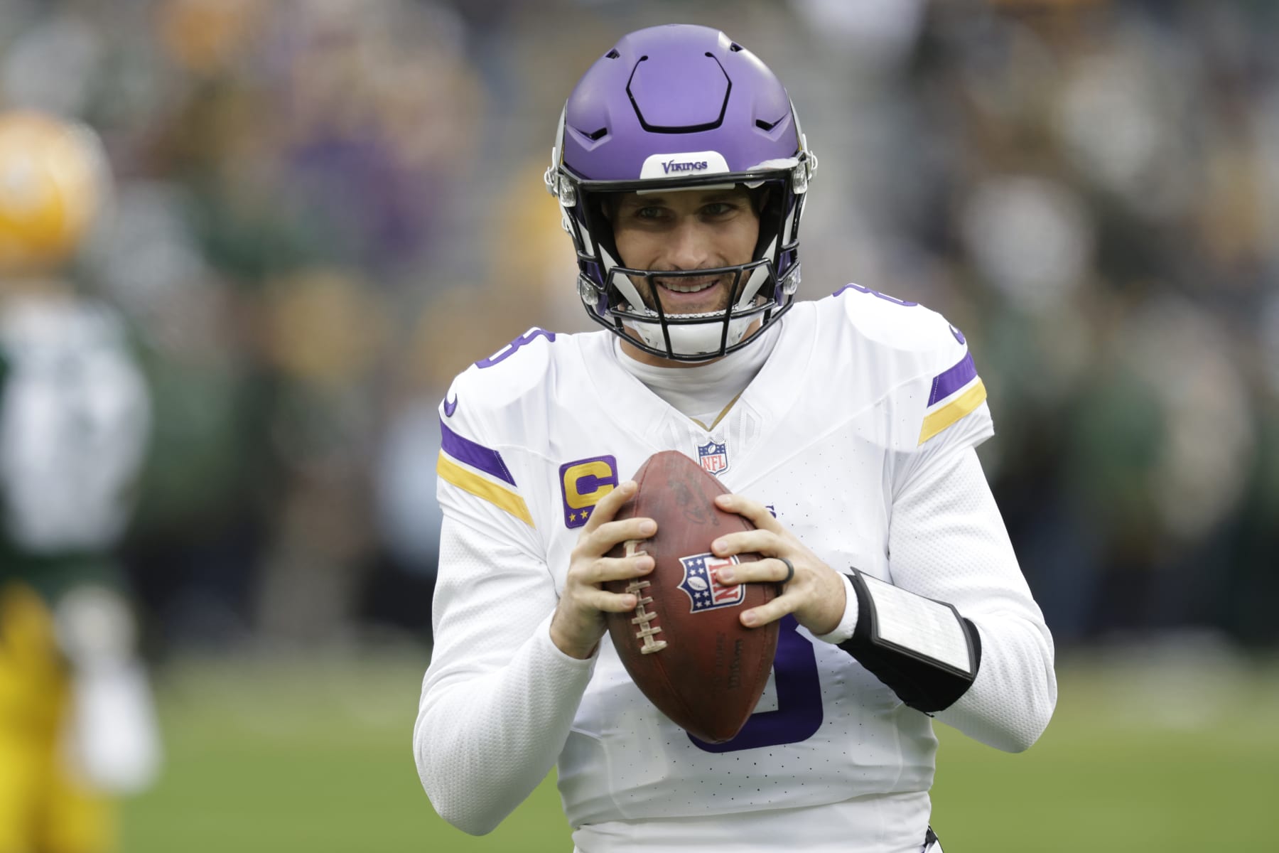 Minnesota Vikings quarterback Kirk Cousins (8) warms up before an NFL football game against the Green Bay Packers, Sunday, Oct. 29, 2023, in Green Bay, Wis. (AP Photo/Matt Ludtke)