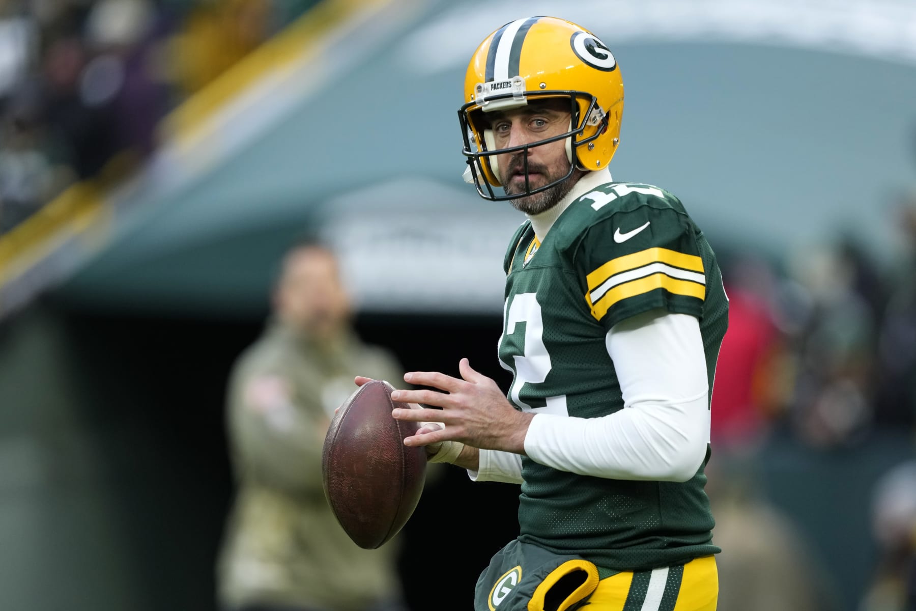 GREEN BAY, WISCONSIN - NOVEMBER 13: Aaron Rodgers #12 of the Green Bay Packers warms up during pregame against the Dallas Cowboys at Lambeau Field on November 13, 2022 in Green Bay, Wisconsin. (Photo by Patrick McDermott/Getty Images)
