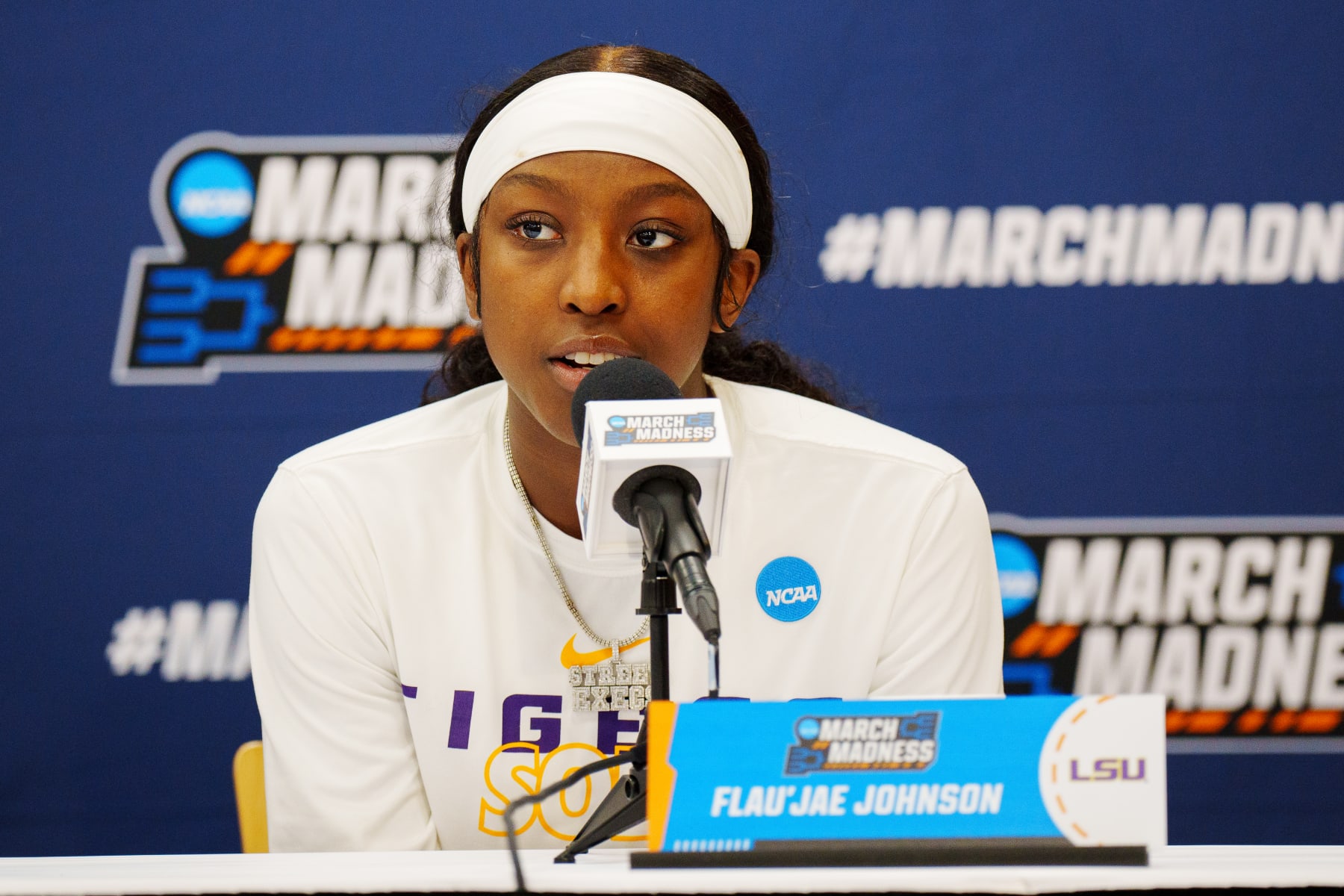 BATON ROUGE, LA - MARCH 17: Flaujae Johnson #4 of the LSU Lady Tigers talks to media during a press conference after the game against the Hawai'i Rainbow Wahine in the first round of the 2023 NCAA Women's Basketball Tournament held at the Pete Maravich Assembly Center on March 17, 2023 in Baton Rouge, Louisiana. (Photo by Rebecca Warren/NCAA Photos via Getty Images)