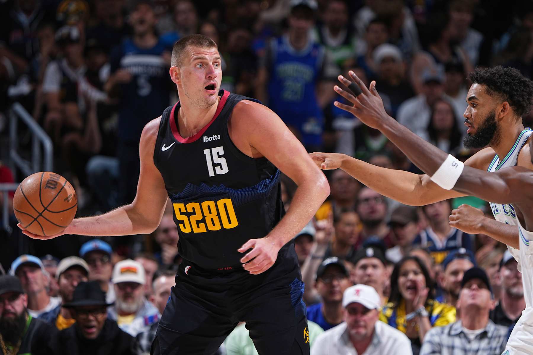 DENVER, CO - MAY 19:  Nikola Jokic #15 of the Denver Nuggets dribbles the ball during the game against the Minnesota Timberwolves during Round 2 Game 7 of the 2024 NBA Playoffs  on May 19, 2024 at the Ball Arena in Denver, Colorado. NOTE TO USER: User expressly acknowledges and agrees that, by downloading and/or using this Photograph, user is consenting to the terms and conditions of the Getty Images License Agreement. Mandatory Copyright Notice: Copyright 2024 NBAE (Photo by Garrett Ellwood/NBAE via Getty Images)