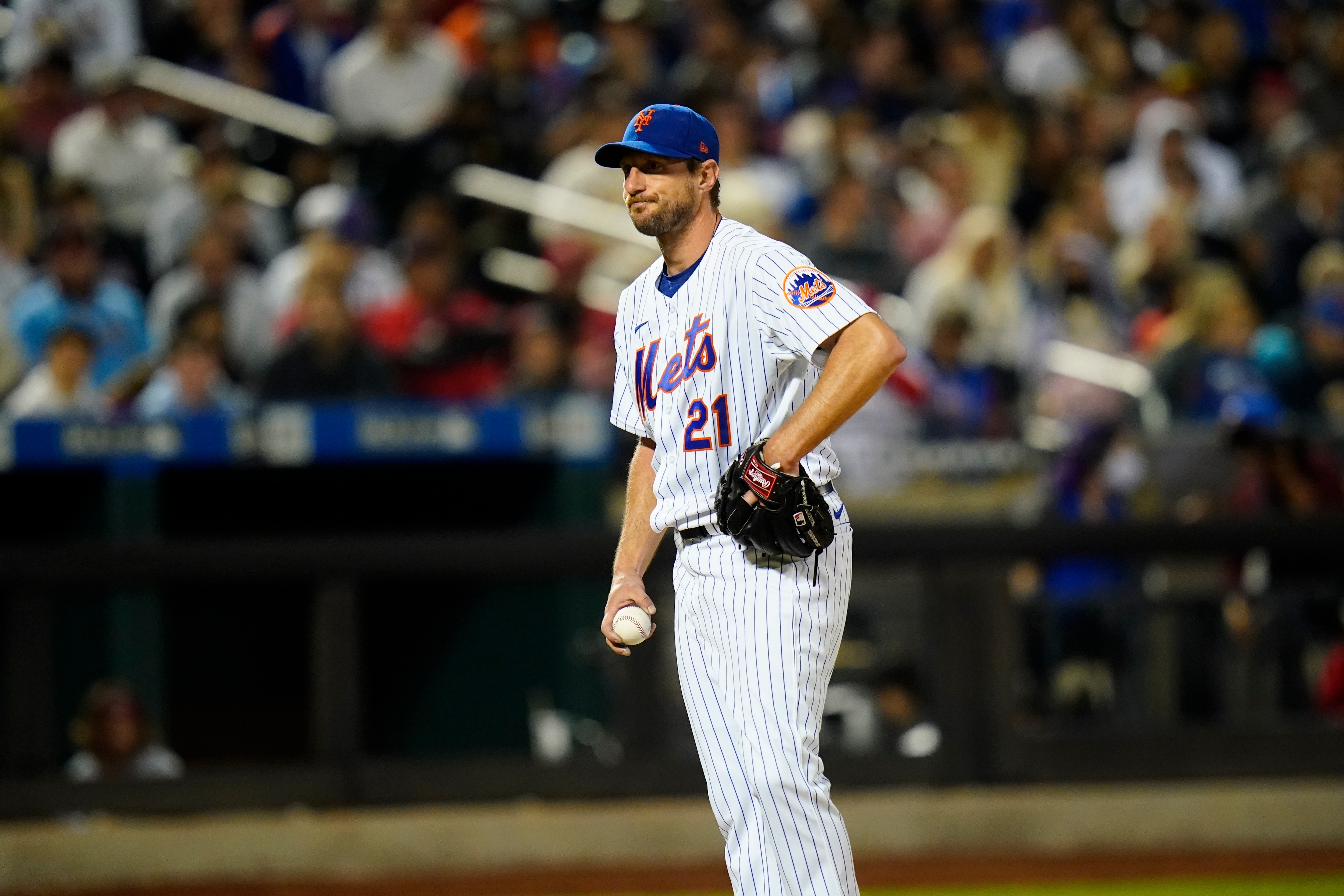 New York Mets starting pitcher Max Scherzer (21) reacts during St. Louis Cardinals' Albert Pujols' at bat in the sixth inning of a baseball game Wednesday, May 18, 2022, in New York. (AP Photo/Frank Franklin II)