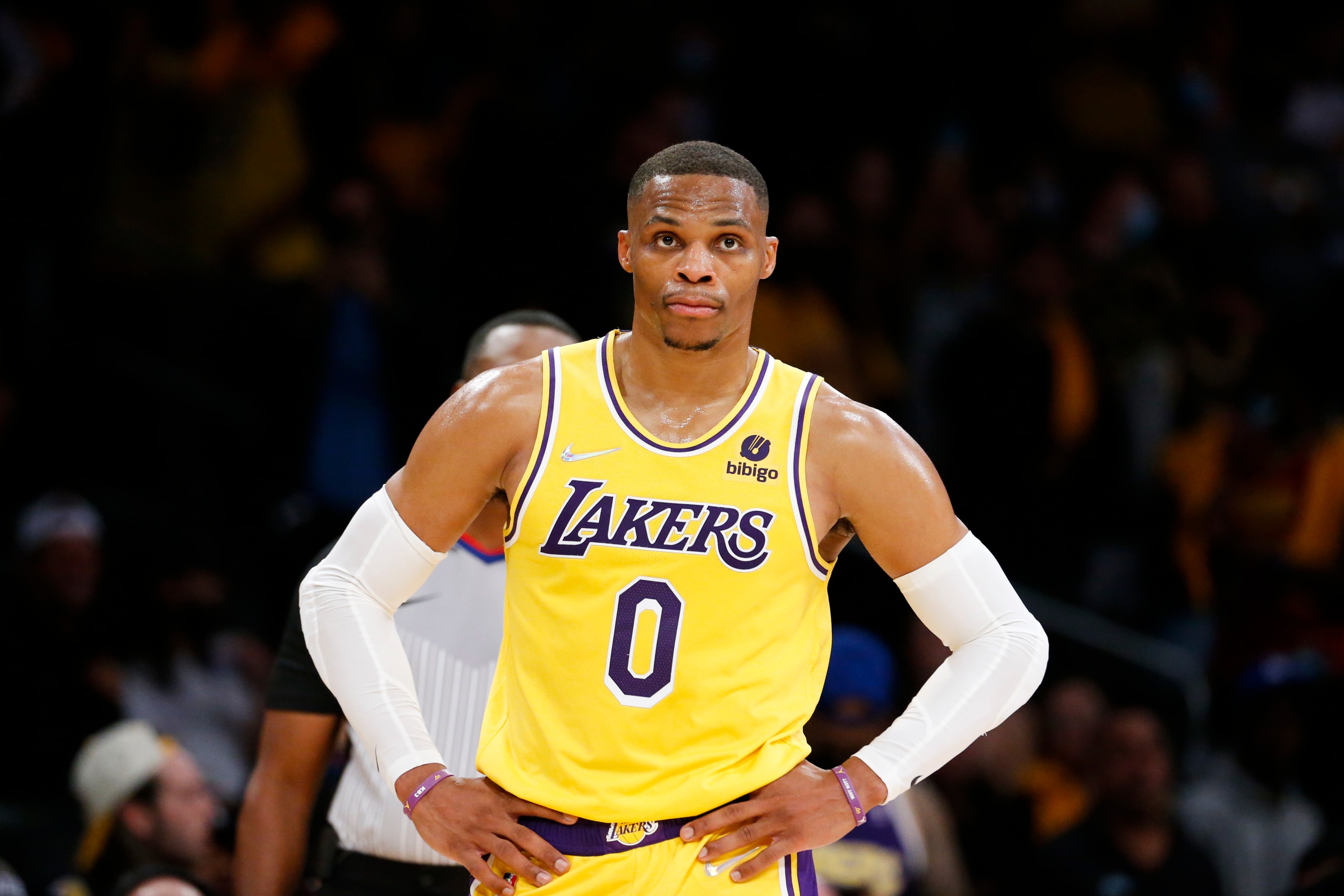 Los Angeles Lakers guard Russell Westbrook (0) looks on against the Golden State Warriors during the second half of an NBA basketball game in Los Angeles, Tuesday, Oct. 19, 2021. The Warriors won 121-114. (AP Photo/Ringo H.W. Chiu)