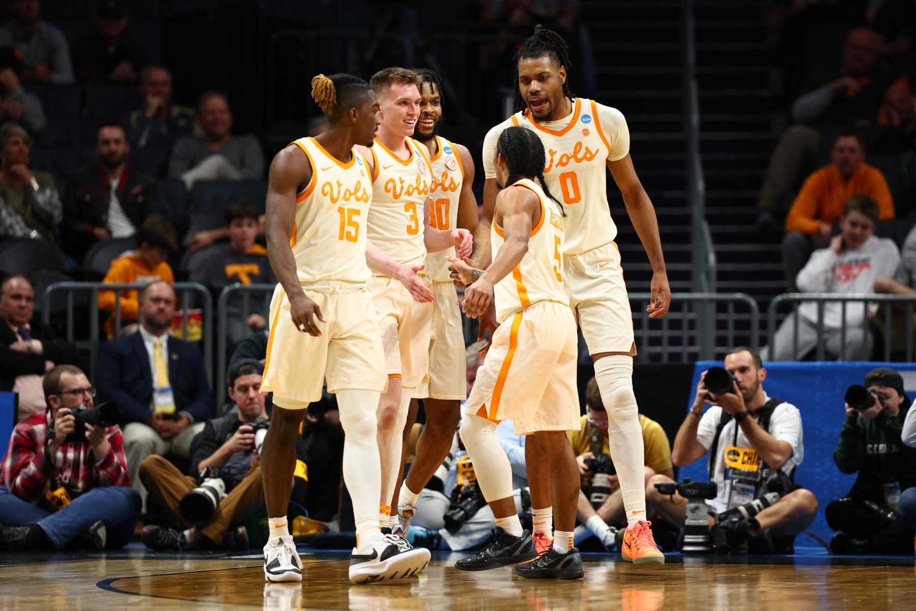 CHARLOTTE, NORTH CAROLINA - MARCH 21: Zakai Zeigler #5 and Dalton Knecht #3 of the Tennessee Volunteers react during the second half against the Saint Peter's Peacocks in the first round of the NCAA Men's Basketball Tournament at Spectrum Center on March 21, 2024 in Charlotte, North Carolina. (Photo by Jared C. Tilton/Getty Images)