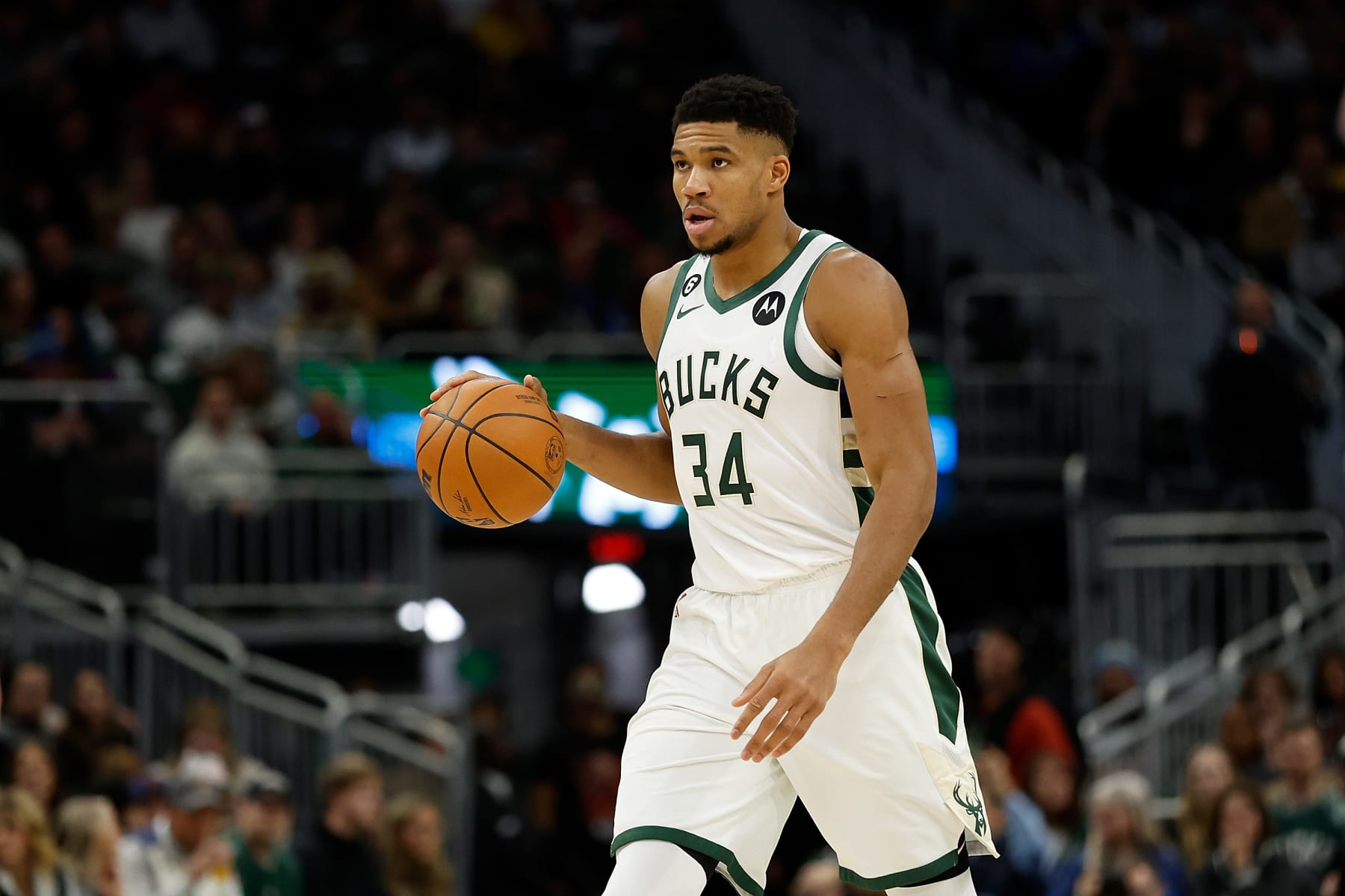 MILWAUKEE, WISCONSIN - NOVEMBER 27: Giannis Antetokounmpo #34 of the Milwaukee Bucks dribbles up court during the first half of the game against the Dallas Mavericks at Fiserv Forum on November 27, 2022 in Milwaukee, Wisconsin. NOTE TO USER: User expressly acknowledges and agrees that, by downloading and or using this photograph, User is consenting to the terms and conditions of the Getty Images License Agreement. (Photo by John Fisher/Getty Images)