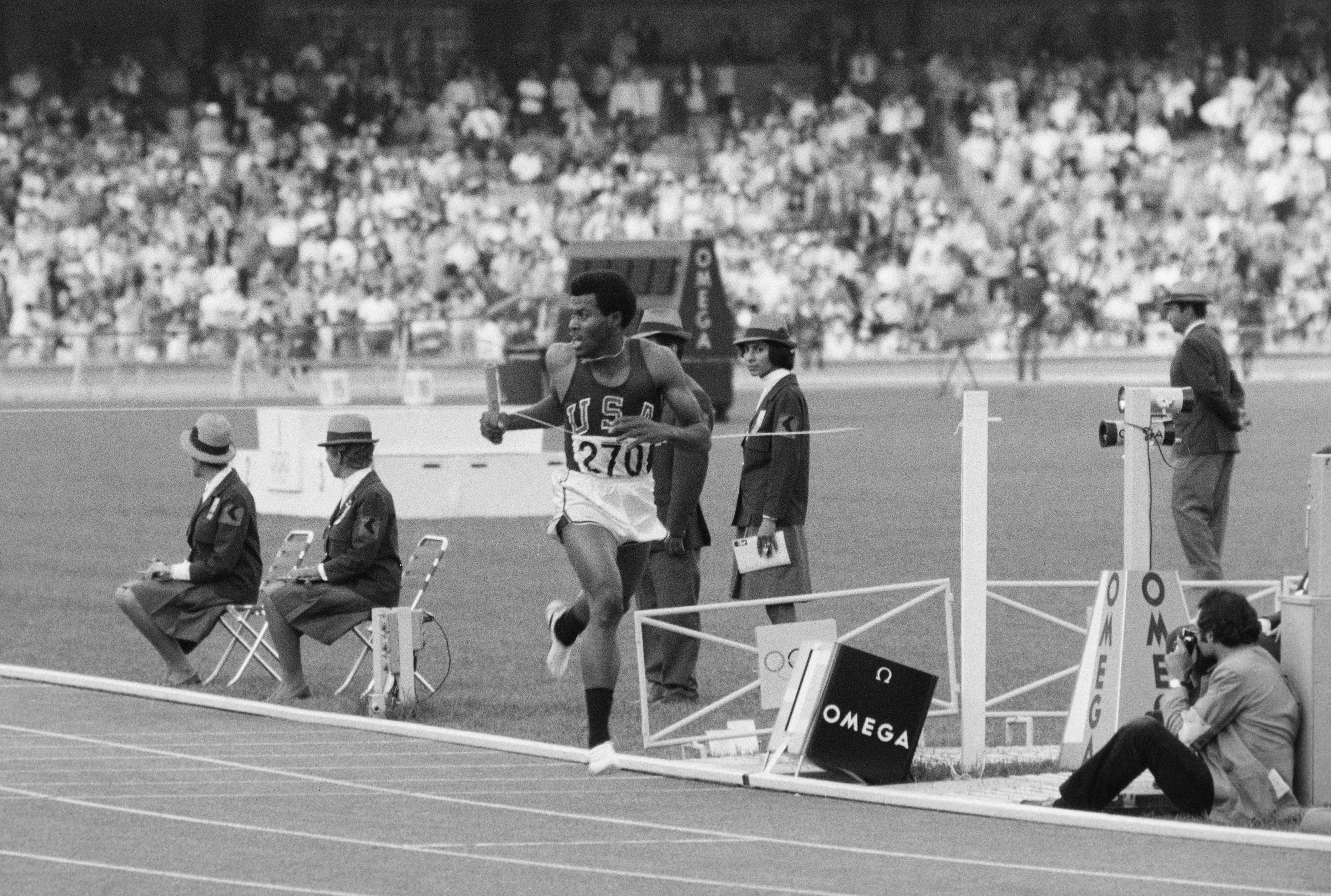 Lee Evans of the United States crosses the line to win the  Men's 4 × 400 metres Relay event at the XIX Summer Olympics on 30th October 1968 at the National Stadium  in Mexico City, Mexico.(Photo by Tony Duffy/Getty Images) 