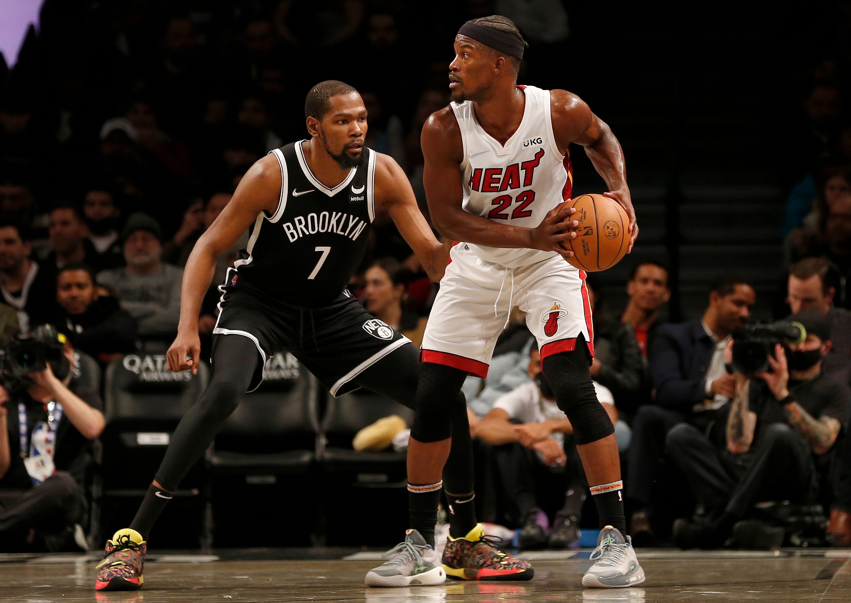 NEW YORK, NEW YORK - OCTOBER 27:  (NEW YORK DAILIES OUT)  Jimmy Butler #22 of the Miami Heat in action against Kevin Durant #7 of the Brooklyn Nets at Barclays Center on October 27, 2021 in New York City. The Heat defeated the Nets 106-93. NOTE TO USER: User expressly acknowledges and agrees that, by downloading and or using this photograph, user is consenting to the terms and conditions of the Getty Images License Agreement. (Photo by Jim McIsaac/2021 Jim McIsaac)