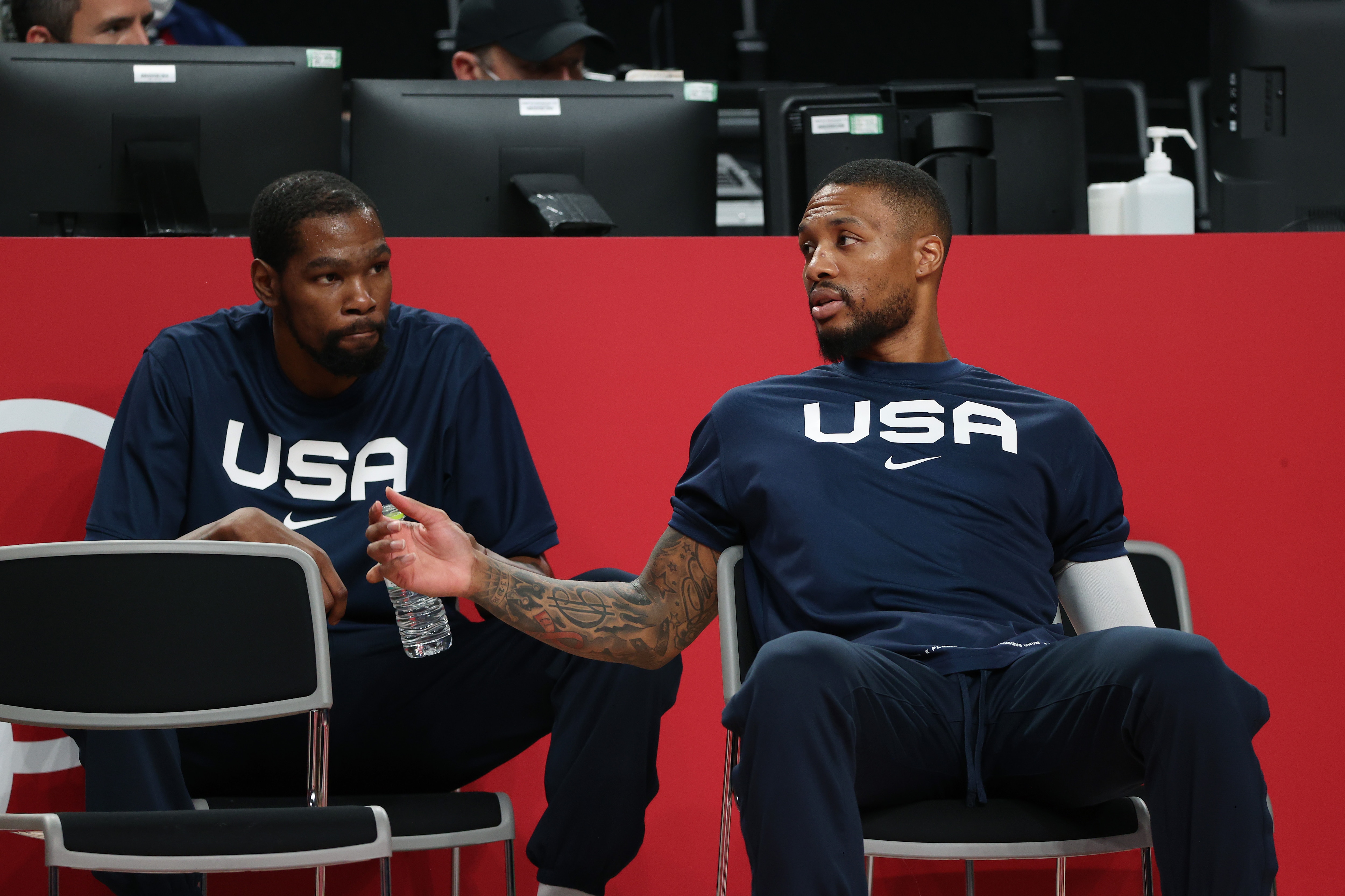 SAITAMA, JAPAN - AUGUST 07: Kevin Durant #7 and Damian Lillard #6 of Team United States talk before a game against Team France in the Men's Basketball Finals game on day fifteen of the Tokyo 2020 Olympic Games at Saitama Super Arena on August 07, 2021 in Saitama, Japan. (Photo by Kevin C. Cox/Getty Images)