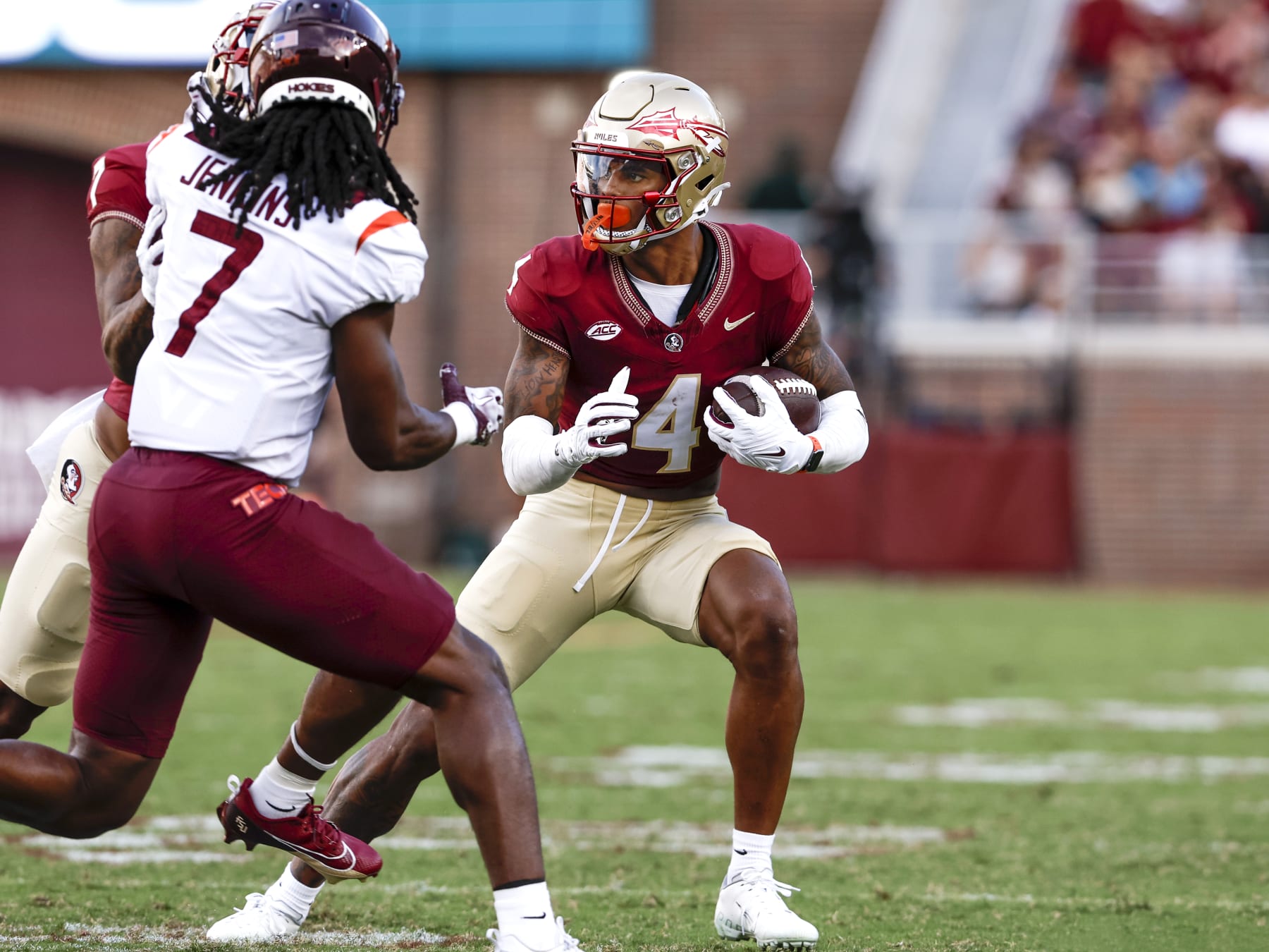 TALLAHASSEE, FL - OCTOBER 7: Wide Receiver Keon Coleman #4 of the Florida State Seminoles on a catch and run during the game against the Virginia Tech Hokies at Doak Campbell Stadium on Bobby Bowden Field on October 7, 2023 in Tallahassee, Florida. The 5th ranked Seminoles defeated the Hokies 39 - 17. (Photo by Don Juan Moore/Getty Images)