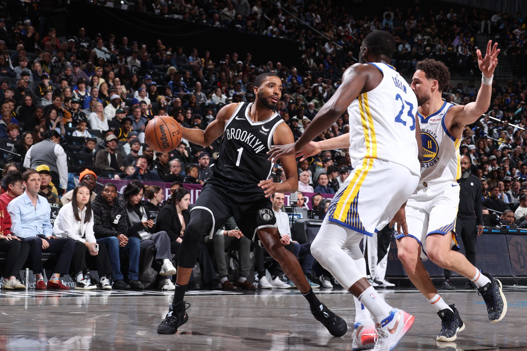 BROOKLYN, NY - FEBRUARY 5: Mikal Bridges #1 of the Brooklyn Nets dribbles the ball during the game against the Golden State Warriors on February 5, 2024 at Barclays Center in Brooklyn, New York. NOTE TO USER: User expressly acknowledges and agrees that, by downloading and or using this Photograph, user is consenting to the terms and conditions of the Getty Images License Agreement. Mandatory Copyright Notice: Copyright 2024 NBAE (Photo by Nathaniel S. Butler/NBAE via Getty Images)