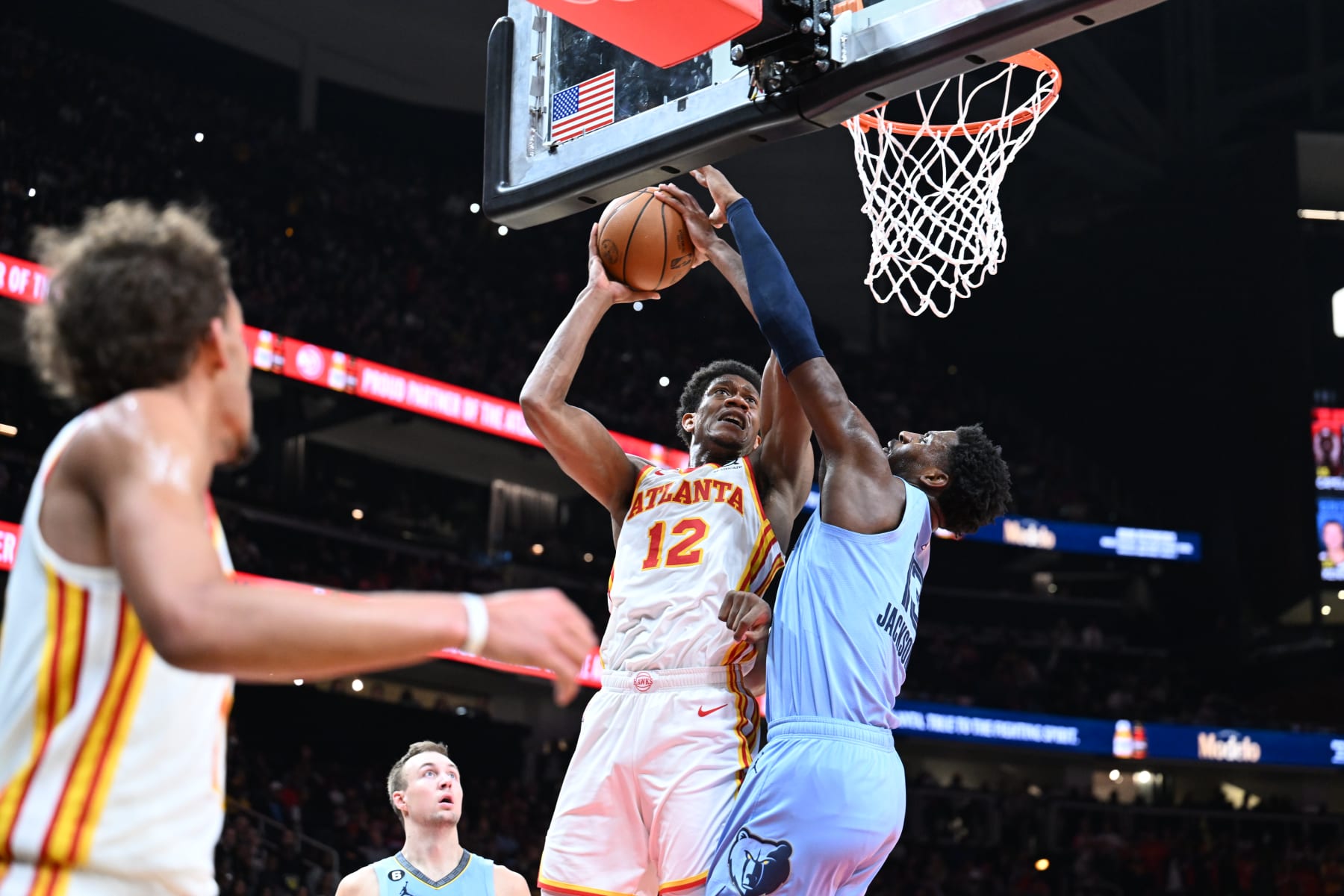 ATLANTA, GA - MARCH 26: De'Andre Hunter #12 of the Atlanta Hawks shoots the ball during the game against the Memphis Grizzlies on March 26, 2023 at State Farm Arena in Atlanta, Georgia.  NOTE TO USER: User expressly acknowledges and agrees that, by downloading and/or using this Photograph, user is consenting to the terms and conditions of the Getty Images License Agreement. Mandatory Copyright Notice: Copyright 2023 NBAE (Photo by Adam Hagy/NBAE via Getty Images)