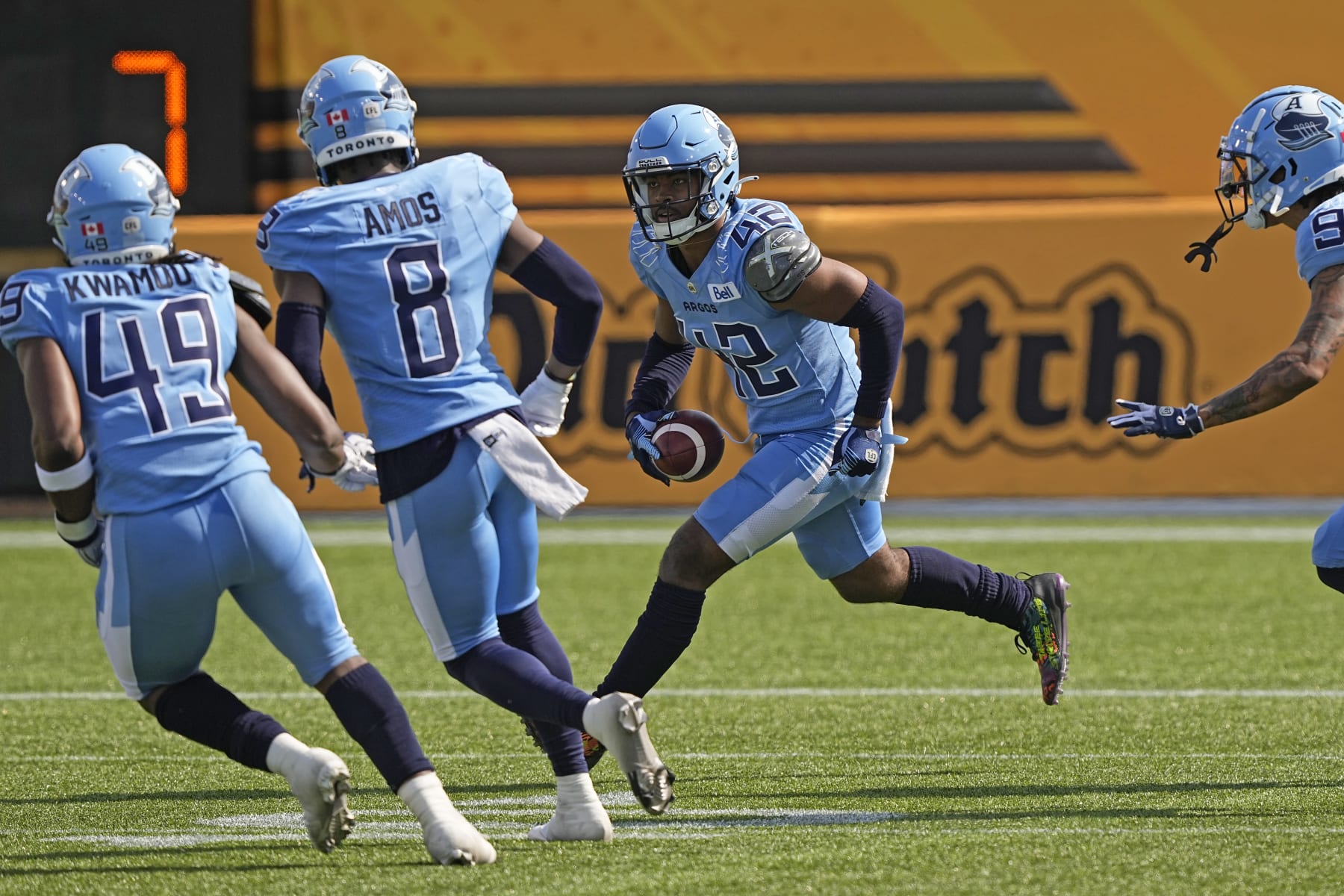 HAMILTON, CANADA - MAY 27: Qwan'tez Stiggers #42 of the Toronto Argonauts returns an interception against the Hamilton Tiger-Cats at Tim Hortons Field on May 27, 2023 in Hamilton, Canada. (Photo by John E. Sokolowski/Getty Images)