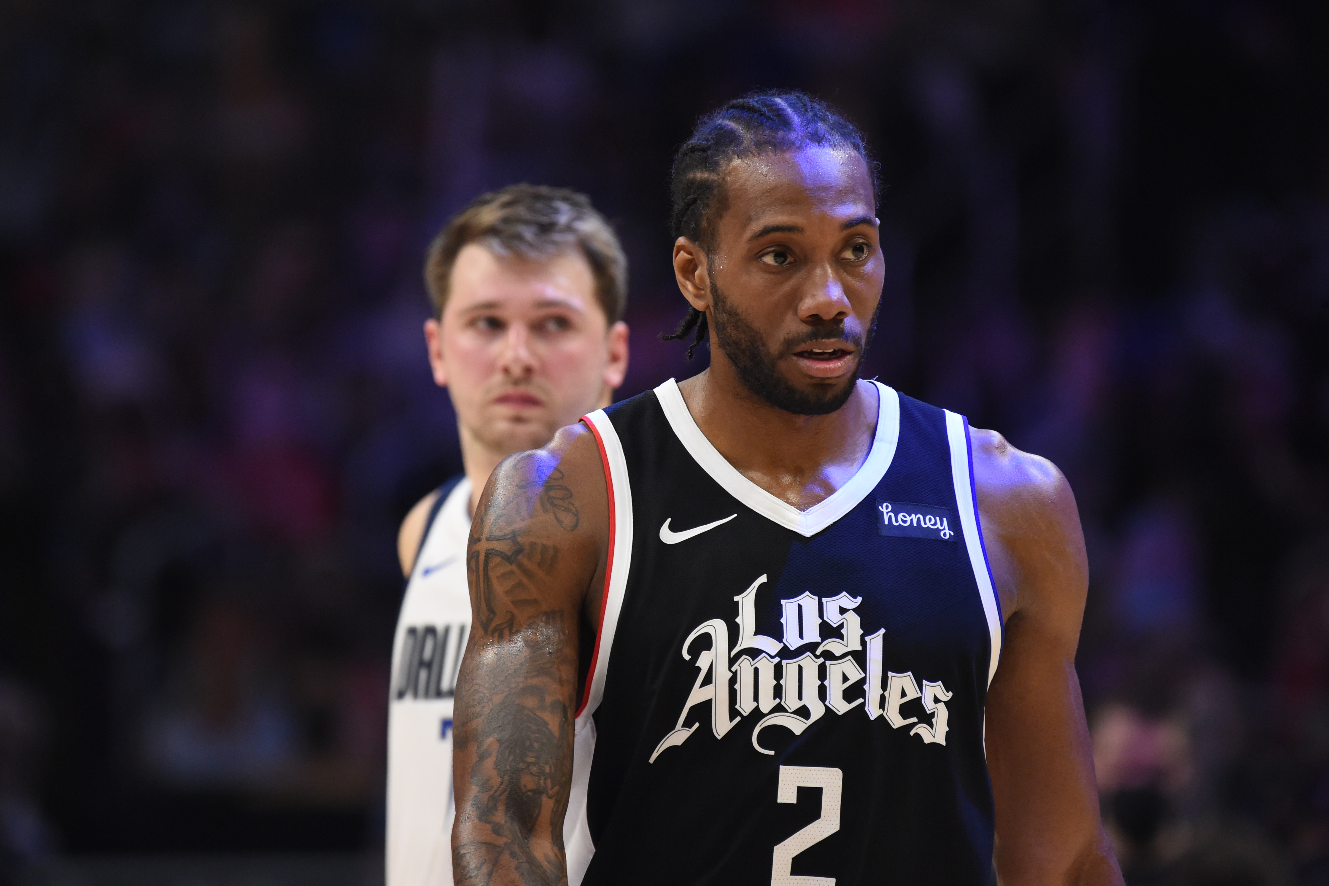 LOS ANGELES, CA - JUNE 6: Kawhi Leonard #2 of the LA Clippers looks on during Round 1, Game 7 of the 2021 NBA Playoffs on June 6, 2021 at STAPLES Center in Los Angeles, California. NOTE TO USER: User expressly acknowledges and agrees that, by downloading and/or using this Photograph, user is consenting to the terms and conditions of the Getty Images License Agreement. Mandatory Copyright Notice: Copyright 2021 NBAE (Photo by Juan Ocampo/NBAE via Getty Images)