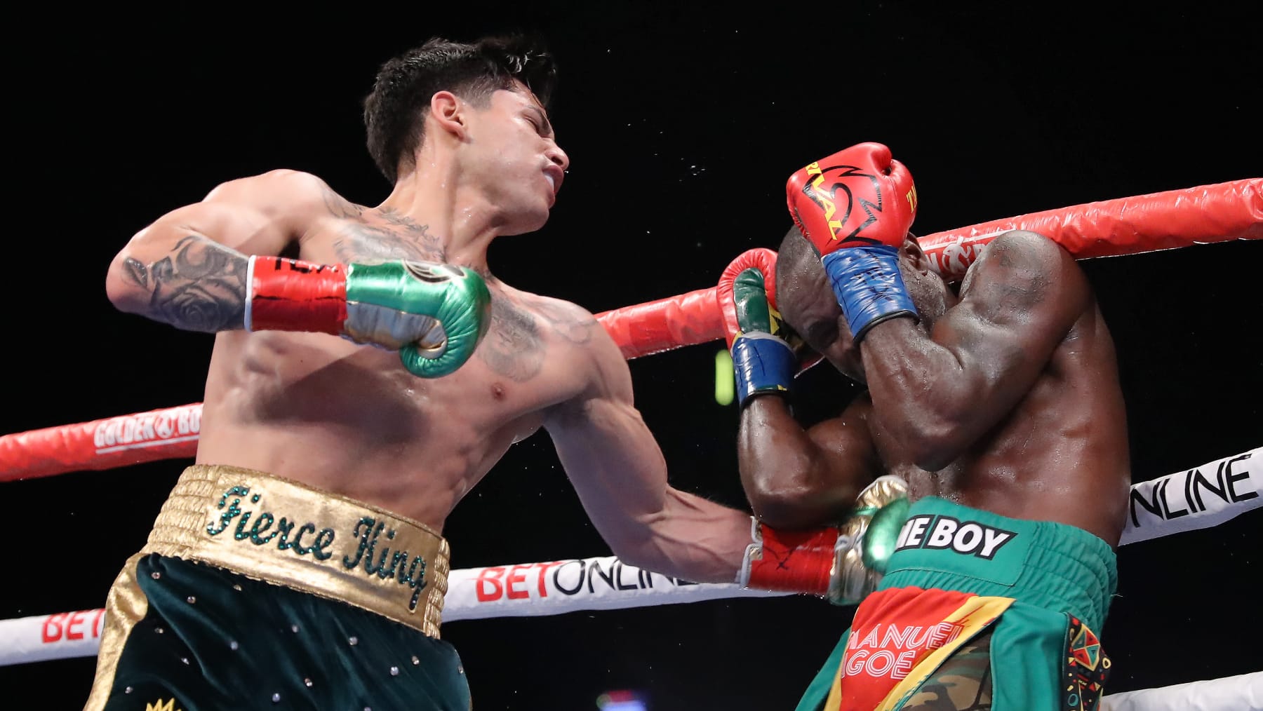 SAN ANTONIO, TEXAS- APRIL 09: Ryan Garcia (L) throws punches to his opponent Emmanuel Tagoe (R) at their light weight fight at Alamodome April 9, 2022 in San Antonio, Texas. (Photo by Tom Hogan/Golden Boy Promotions via Getty Images)