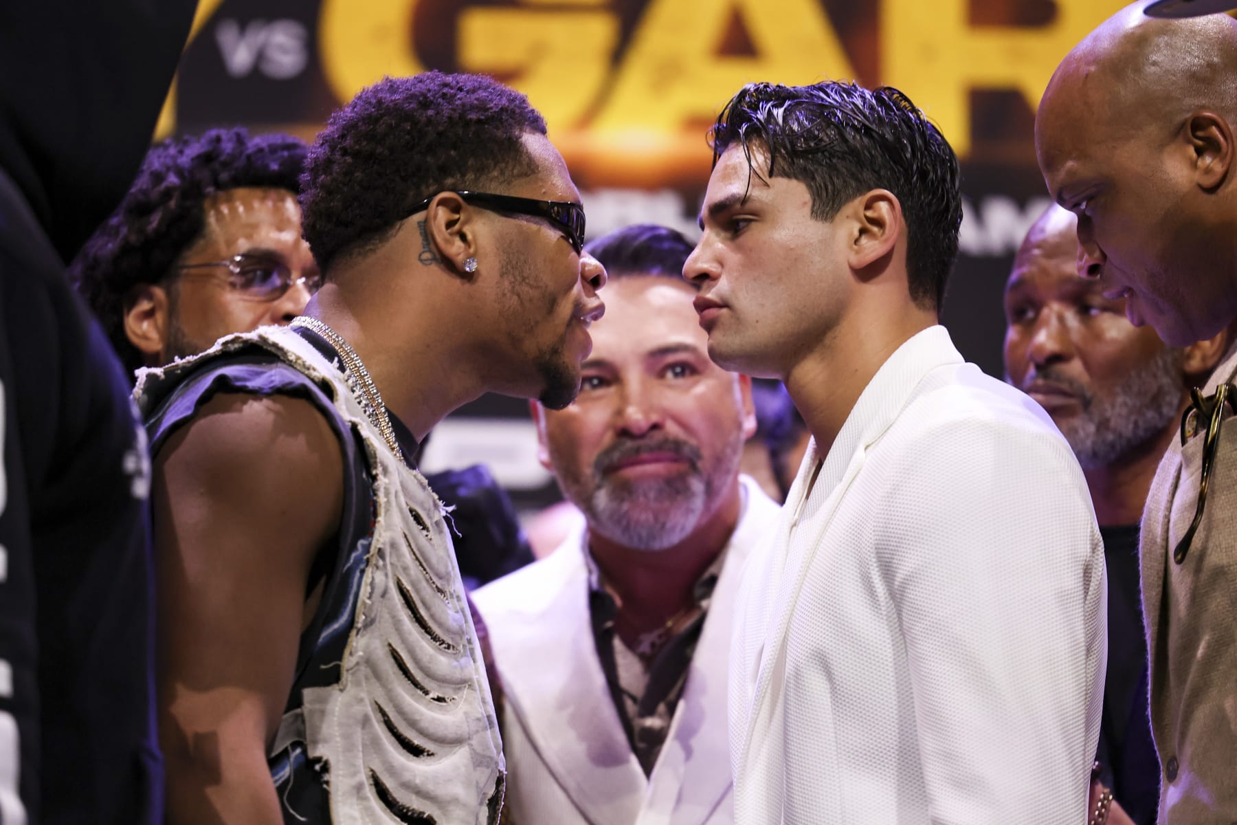 LOS ANGELES, CALIFORNIA - FEBRUARY 29: Devin Haney and Ryan Garcia face off during the Ryan Garcia v Devin Haney press tour at Avalon Hollywood & Bardot on February 29, 2024 in Los Angeles, California. (Photo by Cris Esqueda/Golden Boy/Getty Images)