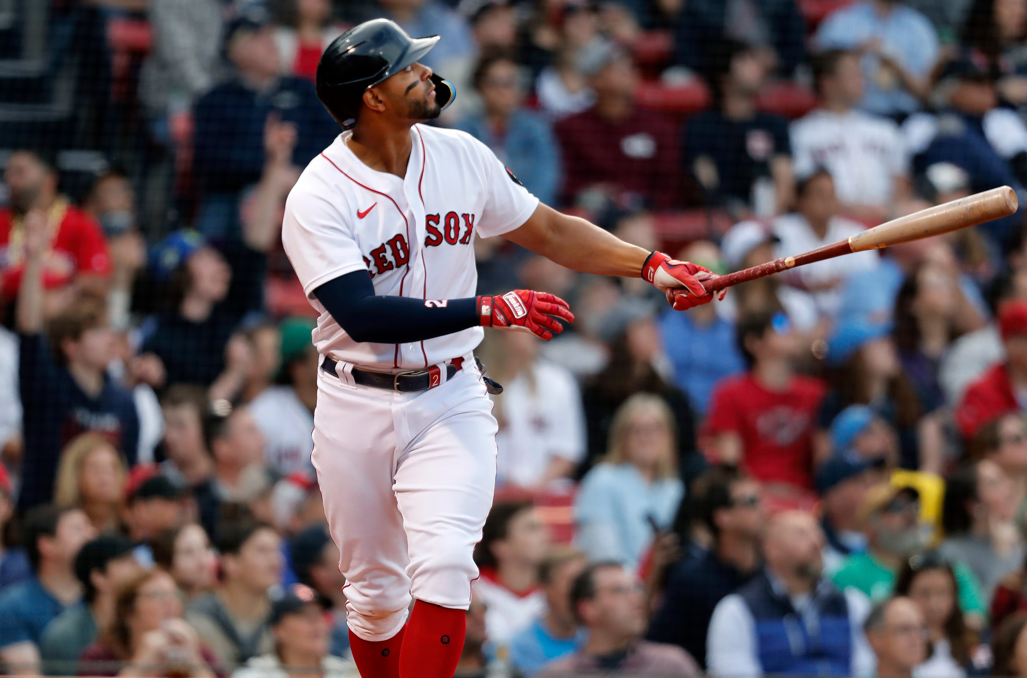 Boston - May 18: The Red Sox Xander Bogaerts watches the flight of his first inning home run. The Boston Red Sox hosted the Houston Astros in a regular season MLB baseball game at Fenway Park in Boston on May 18, 2022. (Photo by Jim Davis/The Boston Globe via Getty Images)