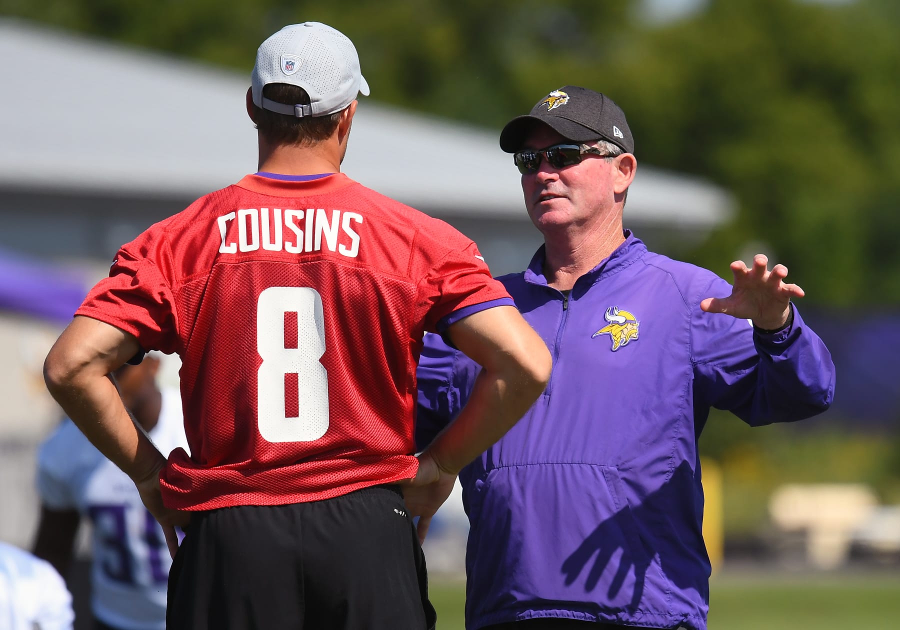 EAGAN, MN - JULY 30: Minnesota Vikings quarterback Kirk Cousins (8) takes direction from Minnesota Vikings Head Coach Mike Zimmer during training camp on July 30, 2018 at Twin Cities Orthopedics Performance Center in Eagan, MN.(Photo by Nick Wosika/Icon Sportswire via Getty Images) EAGAN, MN - JULY 30: Minnesota Vikings quarterback Kirk Cousins (8) takes direction from Minnesota Vikings Head Coach Mike Zimmer during training camp on July 30, 2018 at Twin Cities Orthopedics Performance Center in Eagan, MN.(Photo by Nick Wosika/Icon Sportswire via Getty Images)