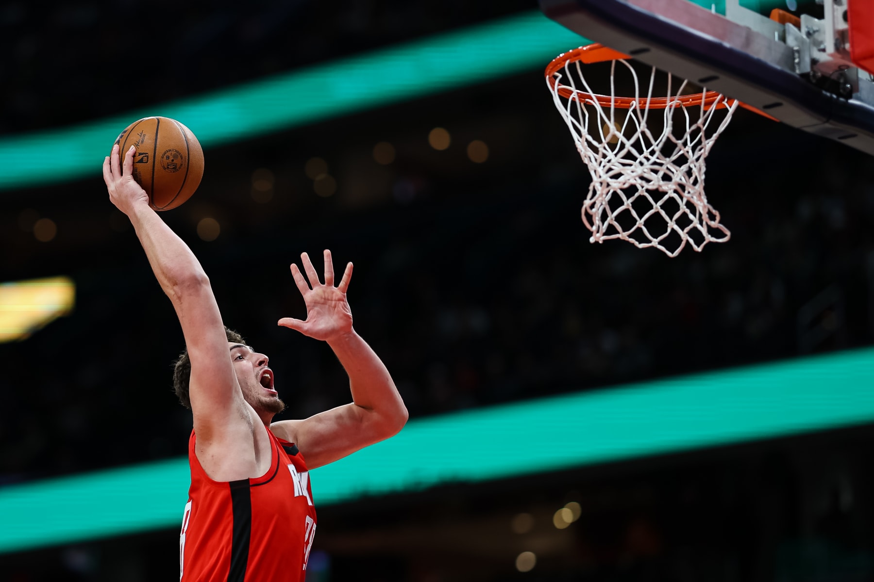 WASHINGTON, DC - APRIL 09: Alperen Sengun #28 of the Houston Rockets goes to the basket against the Washington Wizards during the first half at Capital One Arena on April 9, 2023 in Washington, DC. NOTE TO USER: User expressly acknowledges and agrees that, by downloading and or using this photograph, User is consenting to the terms and conditions of the Getty Images License Agreement. (Photo by Scott Taetsch/Getty Images)