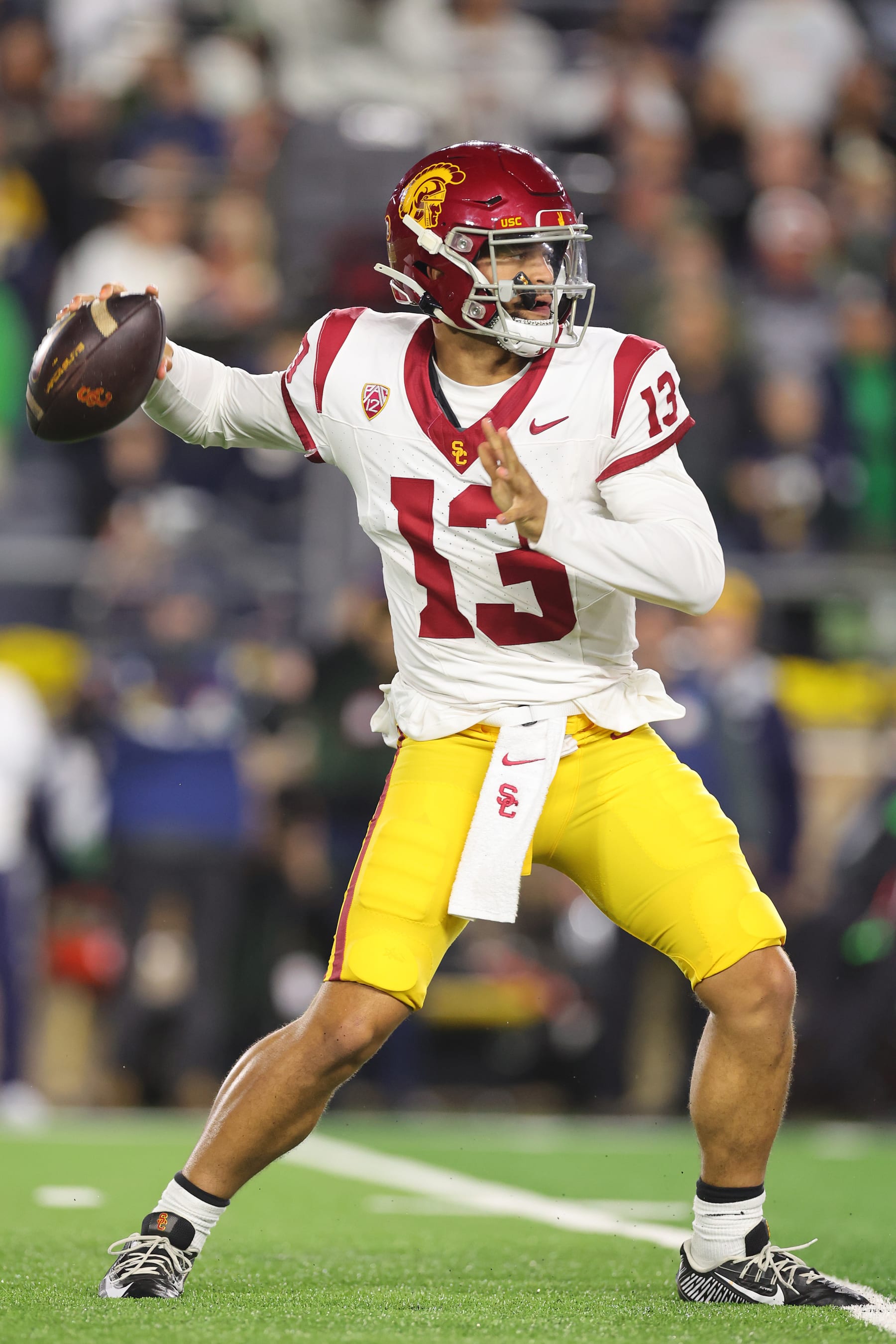 SOUTH BEND, INDIANA - OCTOBER 14: Caleb Williams #13 of the USC Trojans throws a pass against the Notre Dame Fighting Irish during the first half at Notre Dame Stadium on October 14, 2023 in South Bend, Indiana. (Photo by Michael Reaves/Getty Images)