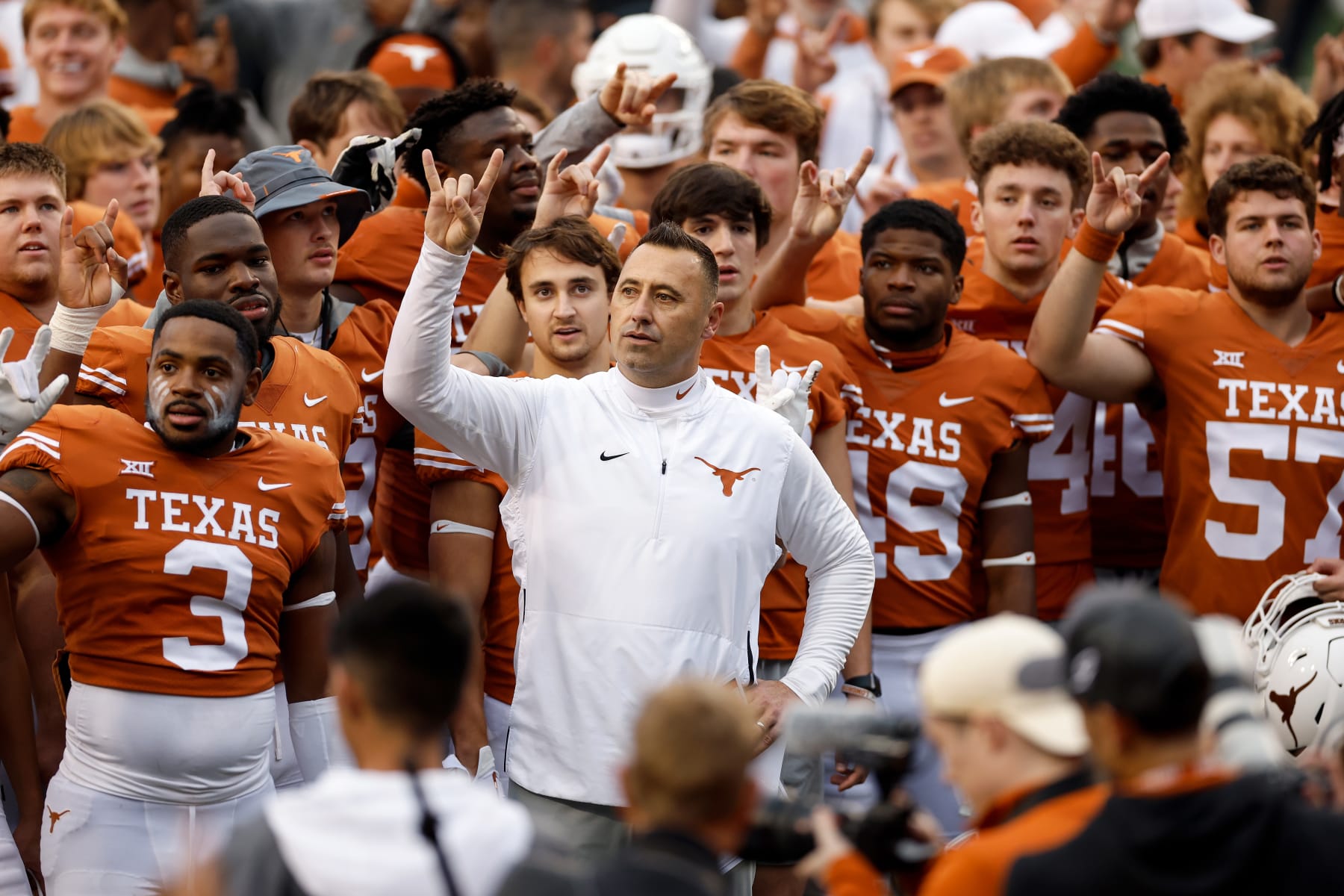 AUSTIN, TEXAS - NOVEMBER 25: The Texas Longhorns stand for the playing of The Eyes of Texas after the game against the Baylor Bears at Darrell K Royal-Texas Memorial Stadium on November 25, 2022 in Austin, Texas. (Photo by Tim Warner/Getty Images)
