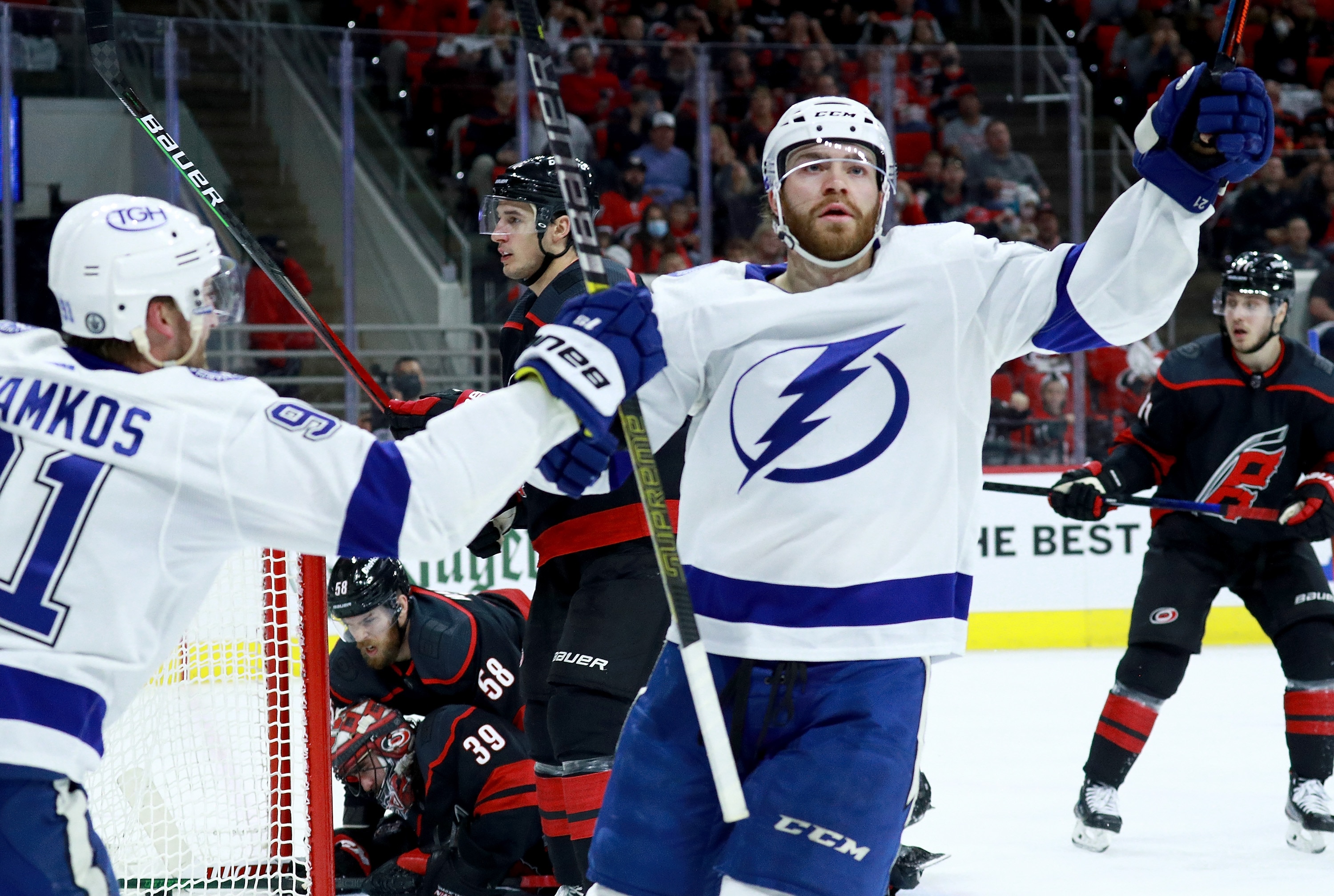 RALEIGH, NORTH CAROLINA - MAY 30:  Brayden Point #21 of the Tampa Bay Lightning reacts after scoring a power play goal against the Carolina Hurricanes during the second period in Game One of the Second Round of the 2021 Stanley Cup Playoffs at PNC Arena on May 30, 2021 in Raleigh, North Carolina. (Photo by Grant Halverson/Getty Images)