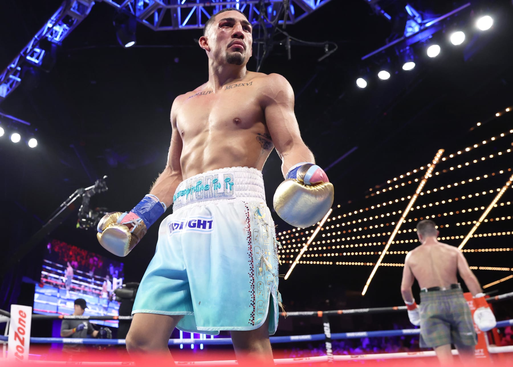 NEW YORK, NEW YORK - JUNE 10: Teofimo Lopez (L) and Josh Taylor (R) at the end of round 7 during their WBO junior welterweight championship fight at The Hulu Theater at Madison Square Garden on June 10, 2023 in New York City. (Photo by Mikey Williams/Top Rank Inc via Getty Images)