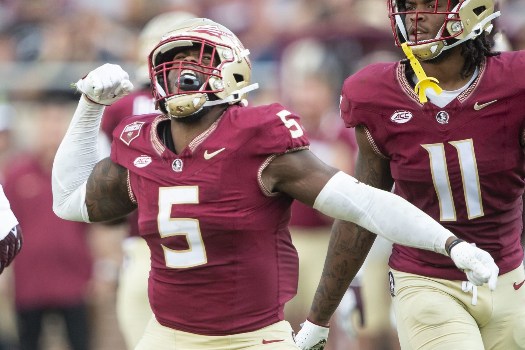 TALLAHASSEE, FLORIDA - OCTOBER 07: Defensive lineman Jared Verse #5 of the Florida State Seminoles celebrates after a big play during the second half of their game against the Virginia Tech Hokies at Doak Campbell Stadium on October 07, 2023 in Tallahassee, Florida. (Photo by Michael Chang/Getty Images)