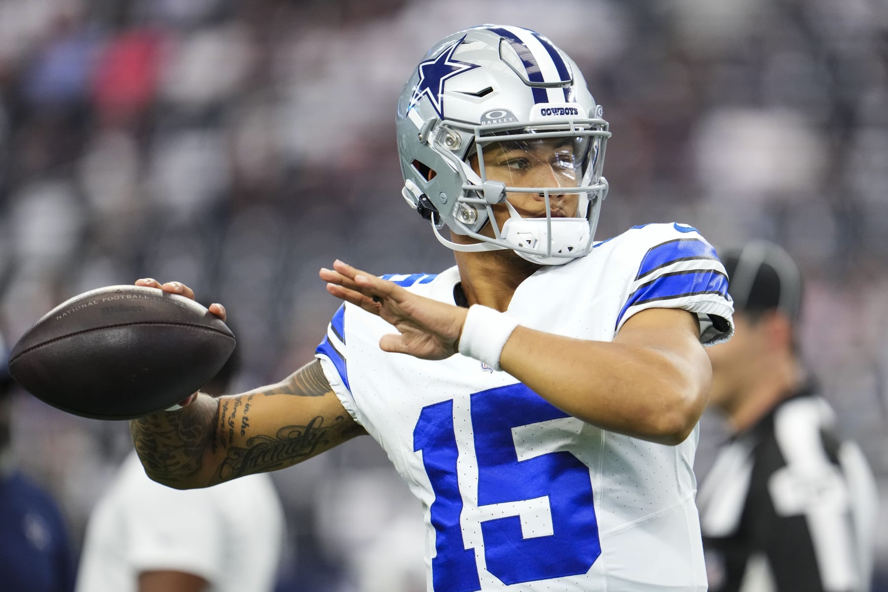 ARLINGTON, TX - OCTOBER 01: Trey Lance #15 of the Dallas Cowboys warms up at AT&T Stadium on October 1, 2023 in Arlington, Texas. (Photo by Cooper Neill/Getty Images)