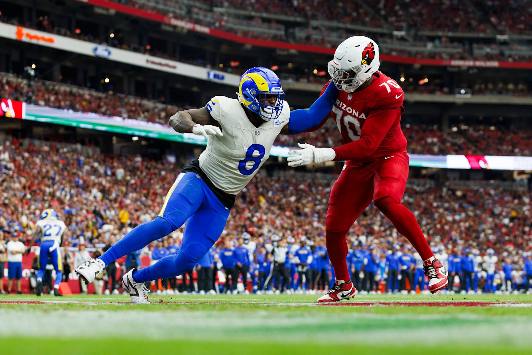 GLENDALE, ARIZONA - SEPTEMBER 15: Jared Verse #8 of the Los Angeles Rams rushes the edge during a game against the Arizona Cardinals at State Farm Stadium on September 15, 2024 in Glendale, Arizona. (Photo by Ric Tapia/Getty Images)