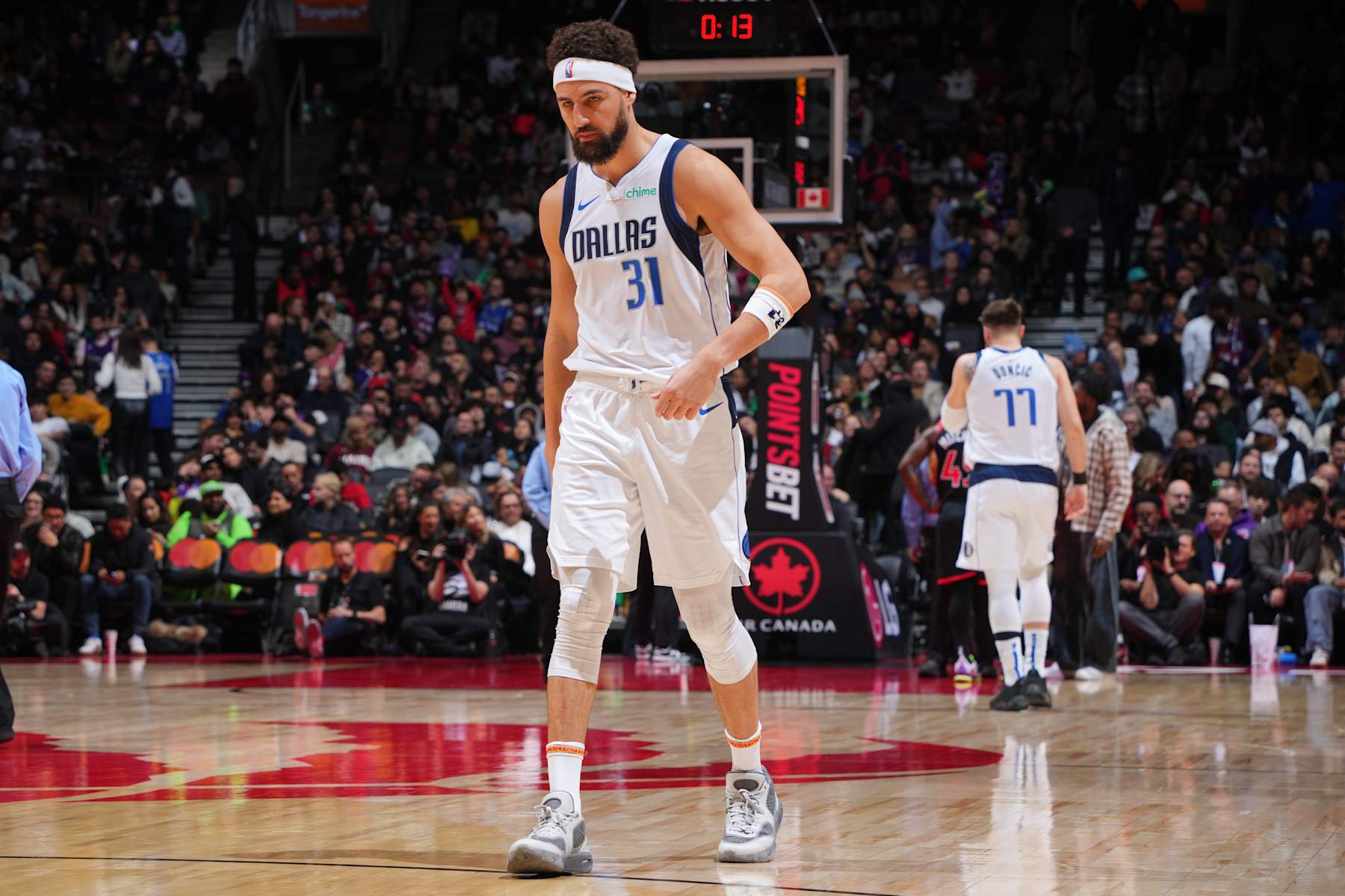 TORONTO, CANADA - DECEMBER 07: Klay Thompson #31 of the Dallas Mavericks looks on during the game against the Toronto Raptors on December 07, 2024 at the Scotiabank Arena in Toronto, Ontario, Canada.  NOTE TO USER: User expressly acknowledges and agrees that, by downloading and or using this Photograph, user is consenting to the terms and conditions of the Getty Images License Agreement.  Mandatory Copyright Notice: Copyright 2024 NBAE (Photo by Mark Blinch/NBAE via Getty Images)