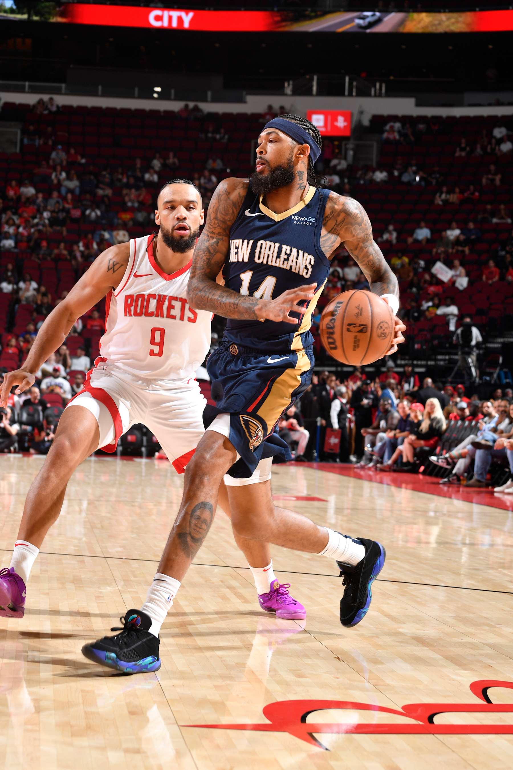 HOUSTON, TX - OCTOBER 15: Brandon Ingram #14 of the New Orleans Pelicans drives to the basket during the game against the Houston Rockets during a NBA preseason game on October 15, 2024 at the Toyota Center in Houston, Texas. NOTE TO USER: User expressly acknowledges and agrees that, by downloading and or using this photograph, User is consenting to the terms and conditions of the Getty Images License Agreement. Mandatory Copyright Notice: Copyright 2024 NBAE (Photo by Logan Riely/NBAE via Getty Images)