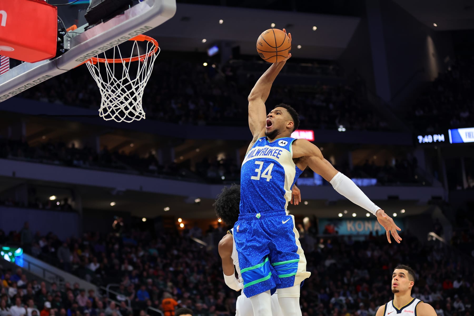 MILWAUKEE, WISCONSIN - FEBRUARY 12: Giannis Antetokounmpo #34 of the Milwaukee Bucks dunks against the Denver Nuggets during the first half of a game at Fiserv Forum on February 12, 2024 in Milwaukee, Wisconsin. NOTE TO USER: User expressly acknowledges and agrees that, by downloading and or using this photograph, User is consenting to the terms and conditions of the Getty Images License Agreement. (Photo by Stacy Revere/Getty Images)
