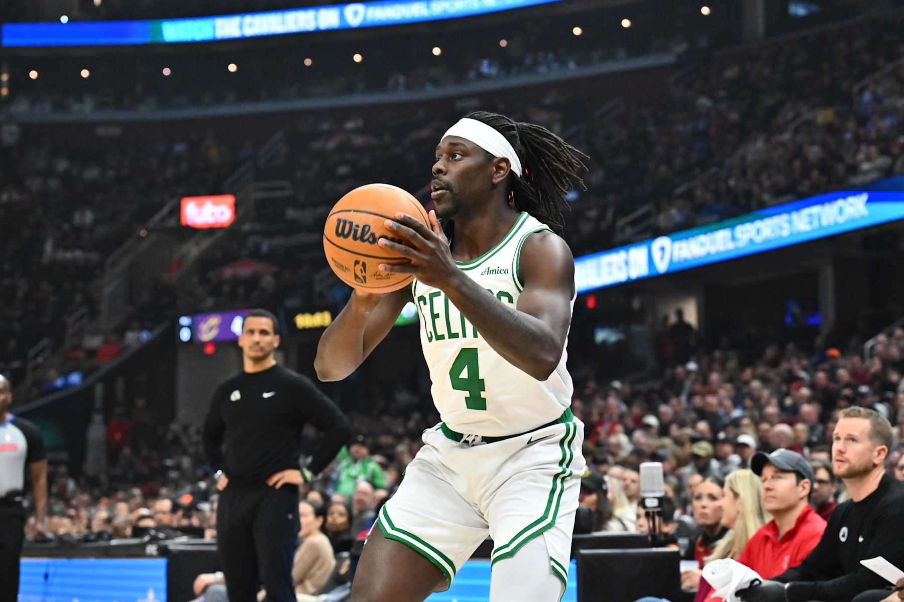 CLEVELAND, OHIO - DECEMBER 01: Jrue Holiday #4 of the Boston Celtics shoots during the first quarter against the Cleveland Cavaliers at Rocket Mortgage Fieldhouse on December 01, 2024 in Cleveland, Ohio. NOTE TO USER: User expressly acknowledges and agrees that, by downloading and or using this photograph, User is consenting to the terms and conditions of the Getty Images License Agreement. (Photo by Jason Miller/Getty Images)