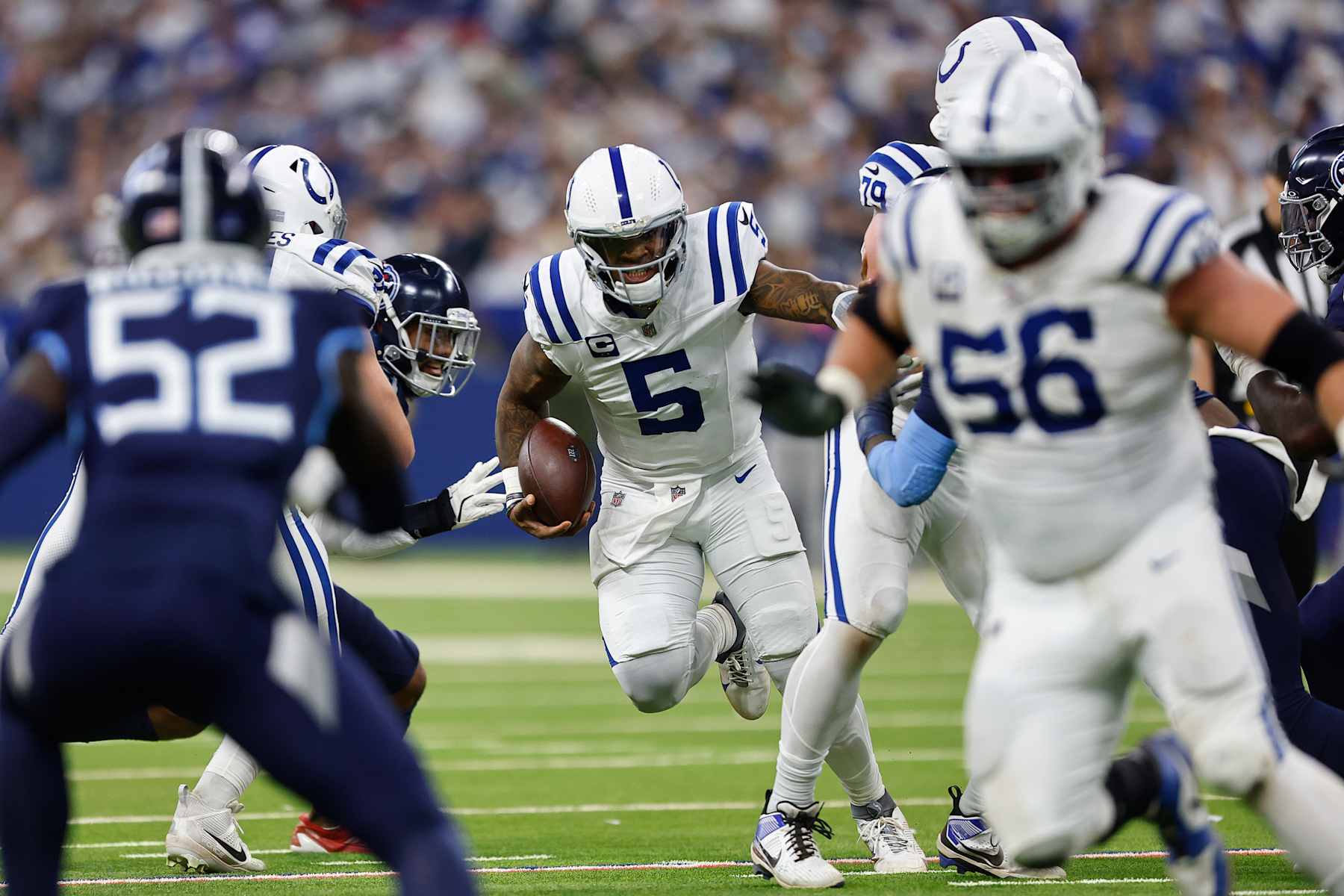 INDIANAPOLIS, IN - DECEMBER 22:  Indianapolis Colts quarterback Anthony Richardson (5) runs the ball during a NFL game between the Tennessee Titans and the Indianapolis Colts on December 22, 2024 at Lucas Oil Stadium in Indianapolis, IN.  (Photo by Jeffrey Brown/Icon Sportswire via Getty Images)